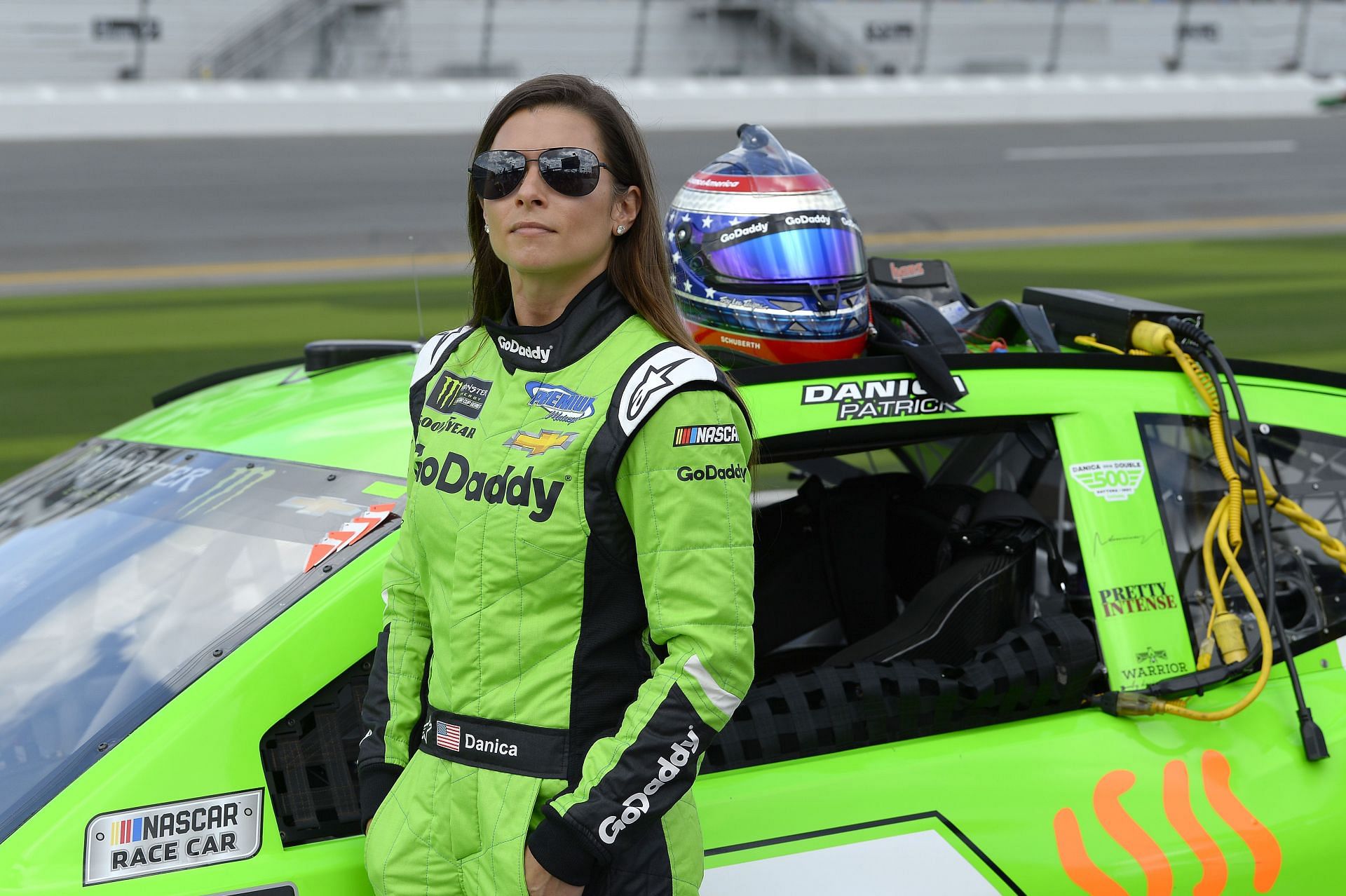 Danica Patrick, driver of the #7 GoDaddy Chevrolet, stands by her car - Source: Getty