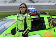 Danica Patrick, driver of the #7 GoDaddy Chevrolet, stands by her car - Source: Getty