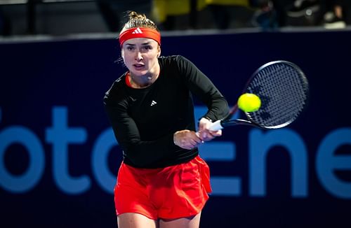 Elina Svitolina of Ukraine in action against Marketa Vondrousova of the Czech Republic in the first round on Day Two of the Qatar TotalEnergies Open - Source: Getty