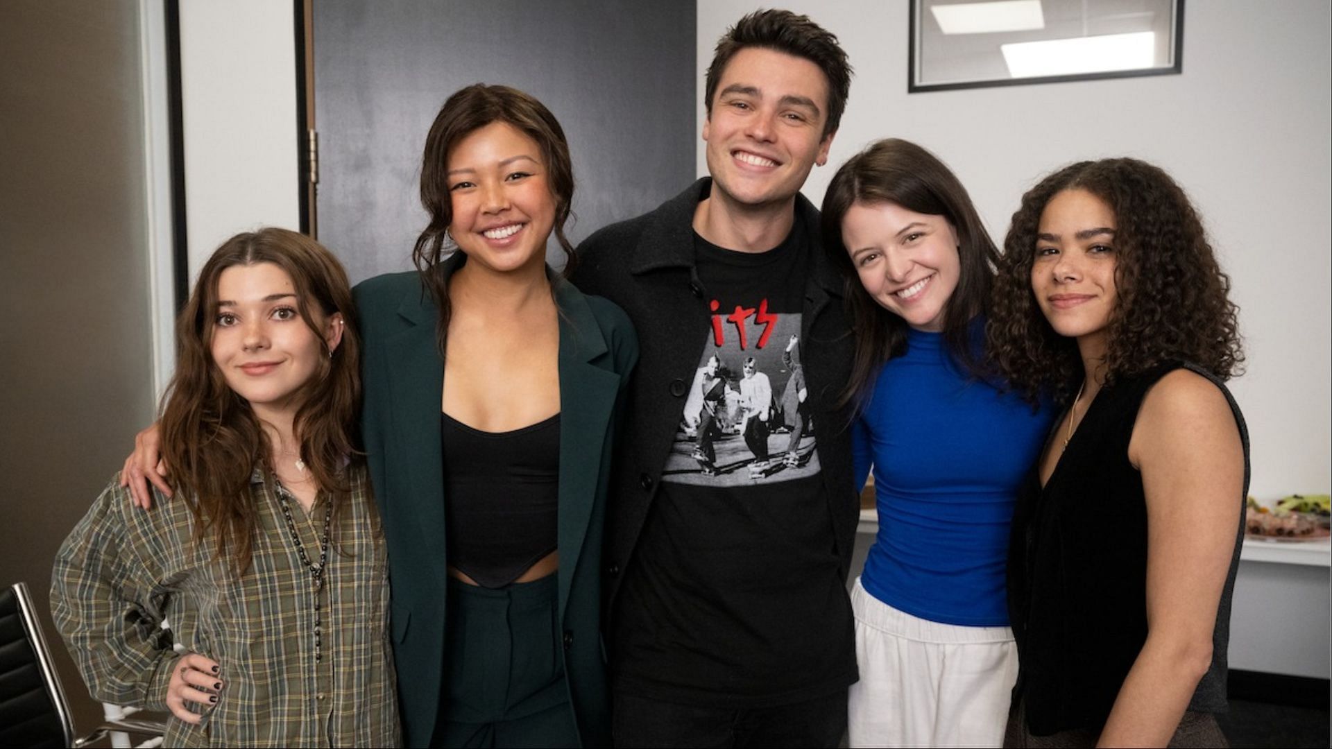 The actors of Ginny &amp; Georgia season 3, comprising Sara Waisglass, Chelsea Clark, Felix Mallard, Antonia Gentry, and Katie Douglas, are seen during the table read. (Image by Amanda Matlovich/Netflix Tudum)