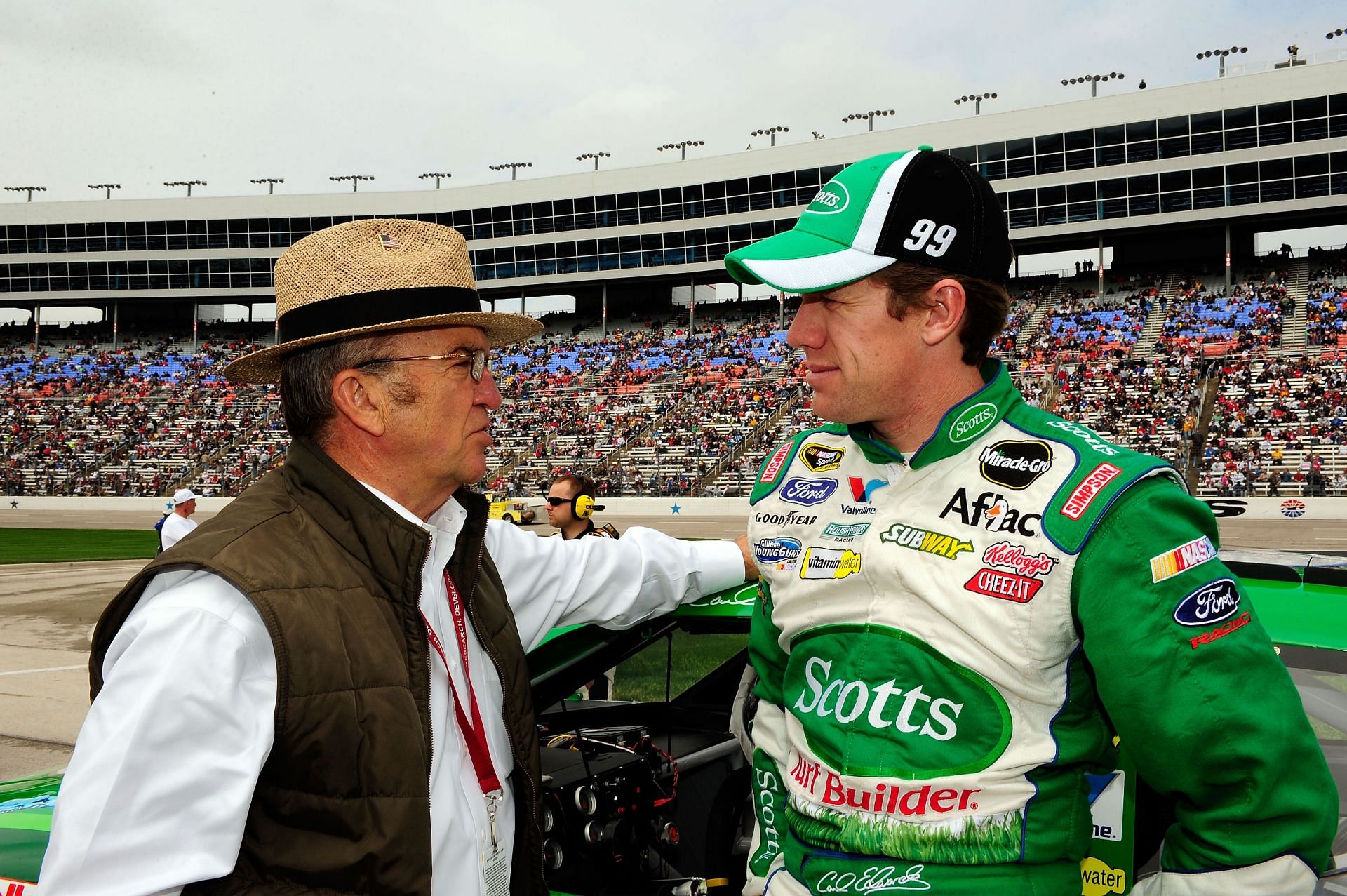 FORT WORTH, TX - APRIL 19:  Carl Edwards, driver of the #99 Scotts Ford, talks with team owner Jack Roush on the grid prior to the start of the NASCAR Sprint Cup Series Samsung Mobile 500 at Texas Motor Speedway on April 19, 2010 in Fort Worth, Texas.  (Photo by Rusty Jarrett/Getty Images for NASCAR) - Source: Getty