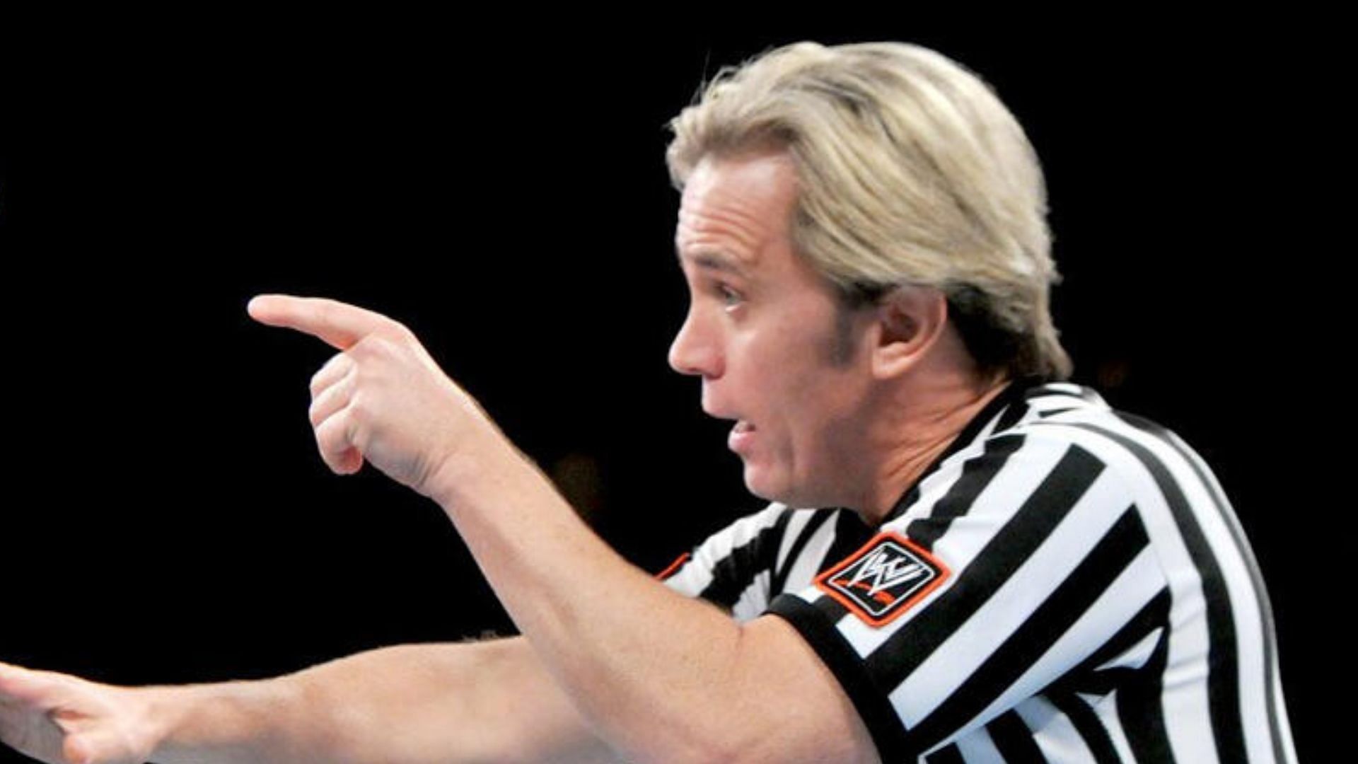 Referees have often helped out when stars have unfortunate accidents (Credit: WWE.com)