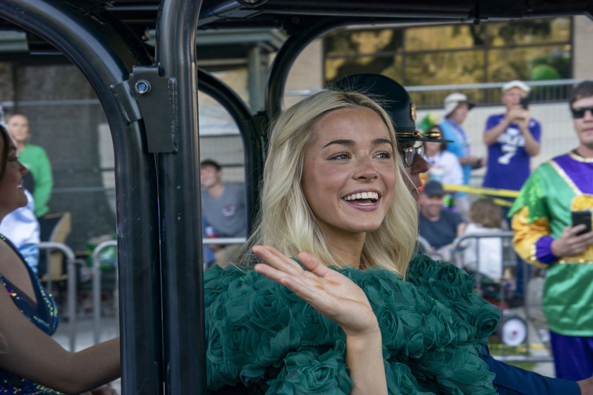 Dunne wearing a green dress during her time at the 2025 Endymion Parade (Image via: Getty Images)