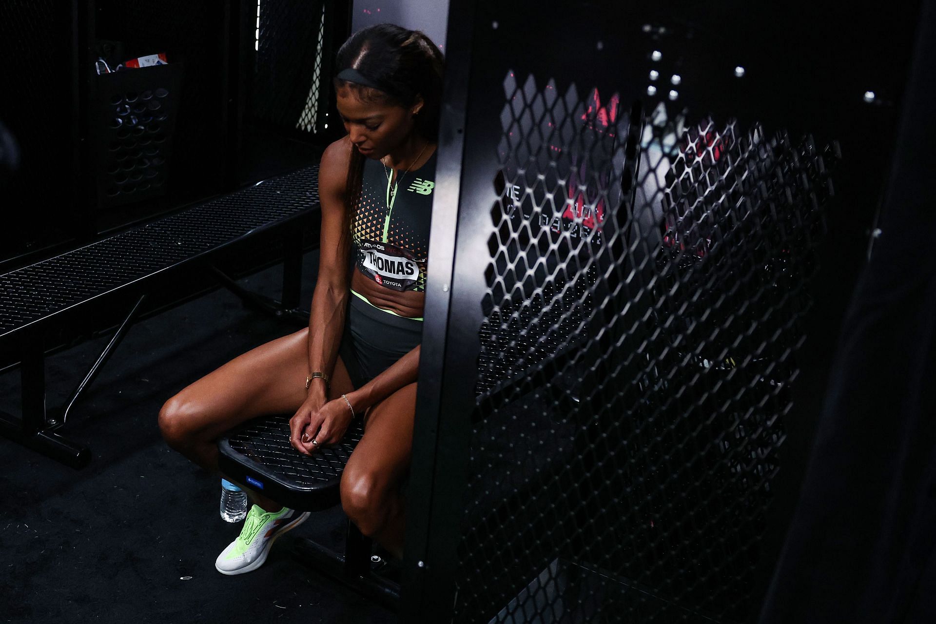 Gabby Thomas takes a moment to herself before competing in the Athlos Track Meet (Image via Getty)