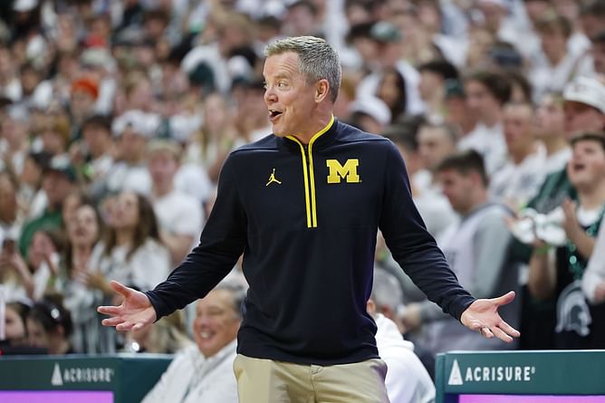 "I just wanted to get out of there": Michigan HC Dusty May speaks out on "logo kiss" controversy following thrashing against Michigan State