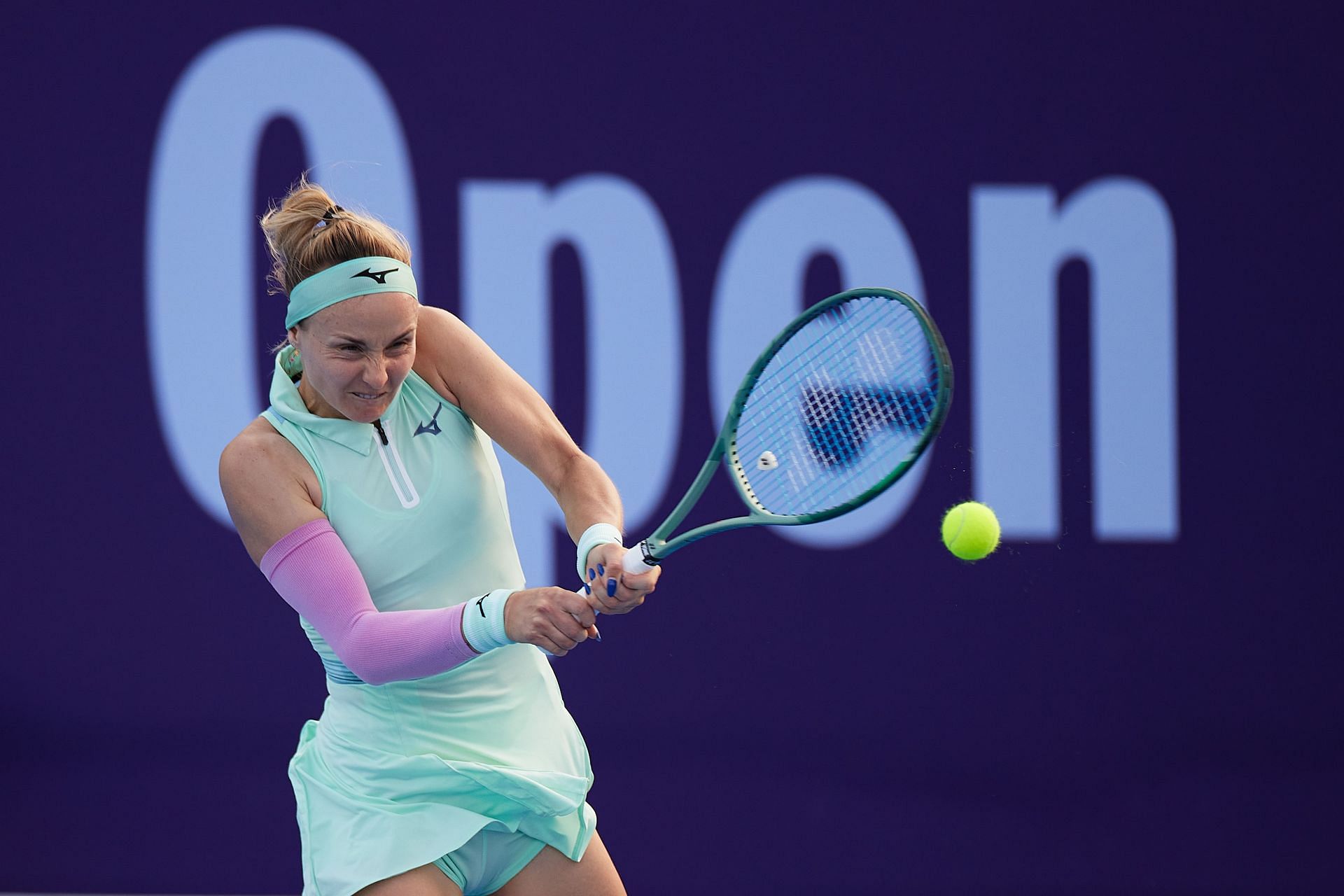 Rebecca Sramkova of Slovakia plays a backhand shot against Elena Rybakina of Kazakhstan during day four of the Qatar TotalEnergies Open - Source: Getty