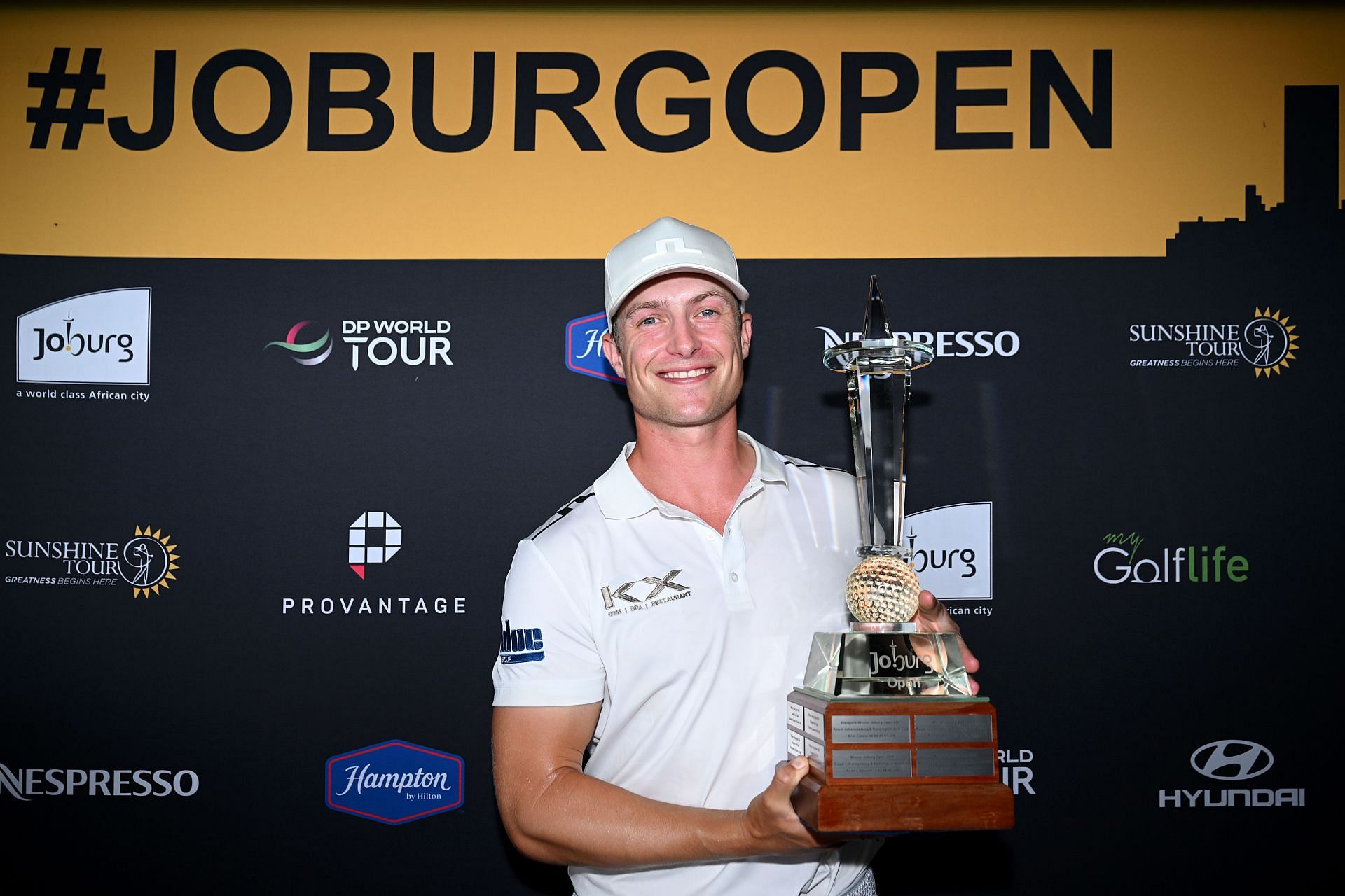 Calum Hill with the Joburg Open 2025 trophy - Source: Getty