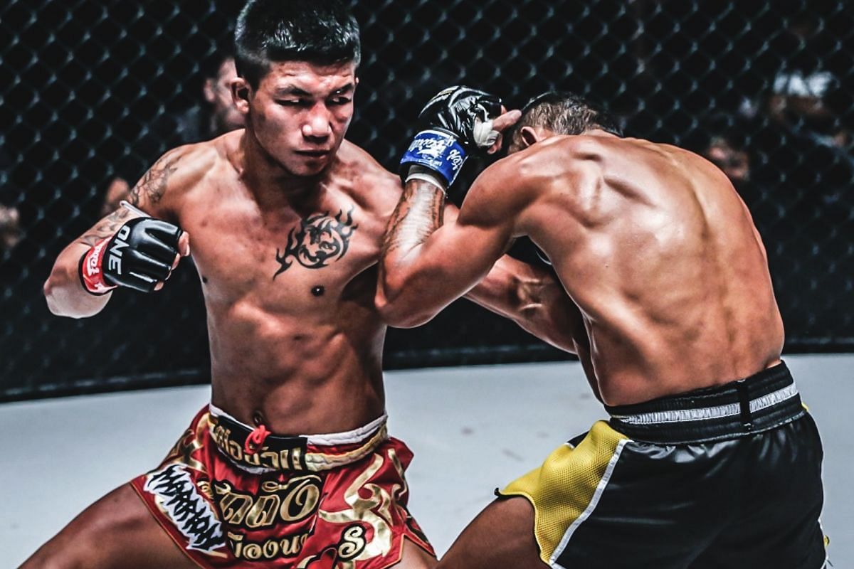 Rodtang (left) hammers away with punches in a bout against Walter Goncalvez [Photo via ONE Championship]