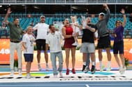 Aryna Sabalenka posing with the Miami Open trophy with her team. (Source: Getty)