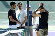 Carlos Alcaraz pictured with coach Juan Carlos Ferrero at his pre-match practice - Image Source: Getty