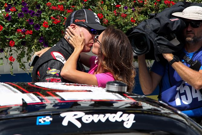 Kurt Busch’s girlfriend soaks in the sun showing off her fit physique amid a romantic getaway with her beau