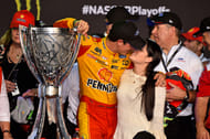 Joey Logano (22) kisses his wife Brittany after winning the Ford EcoBoost 400 and the NASCAR Cup Championship at Homestead-Miami Speedway, November 18, 2018 - Source: Imagn