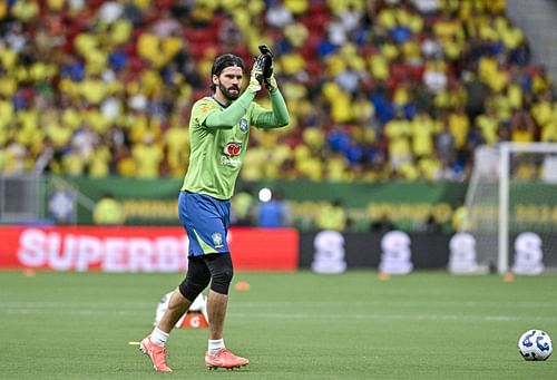 Alisson Becker warming up. 