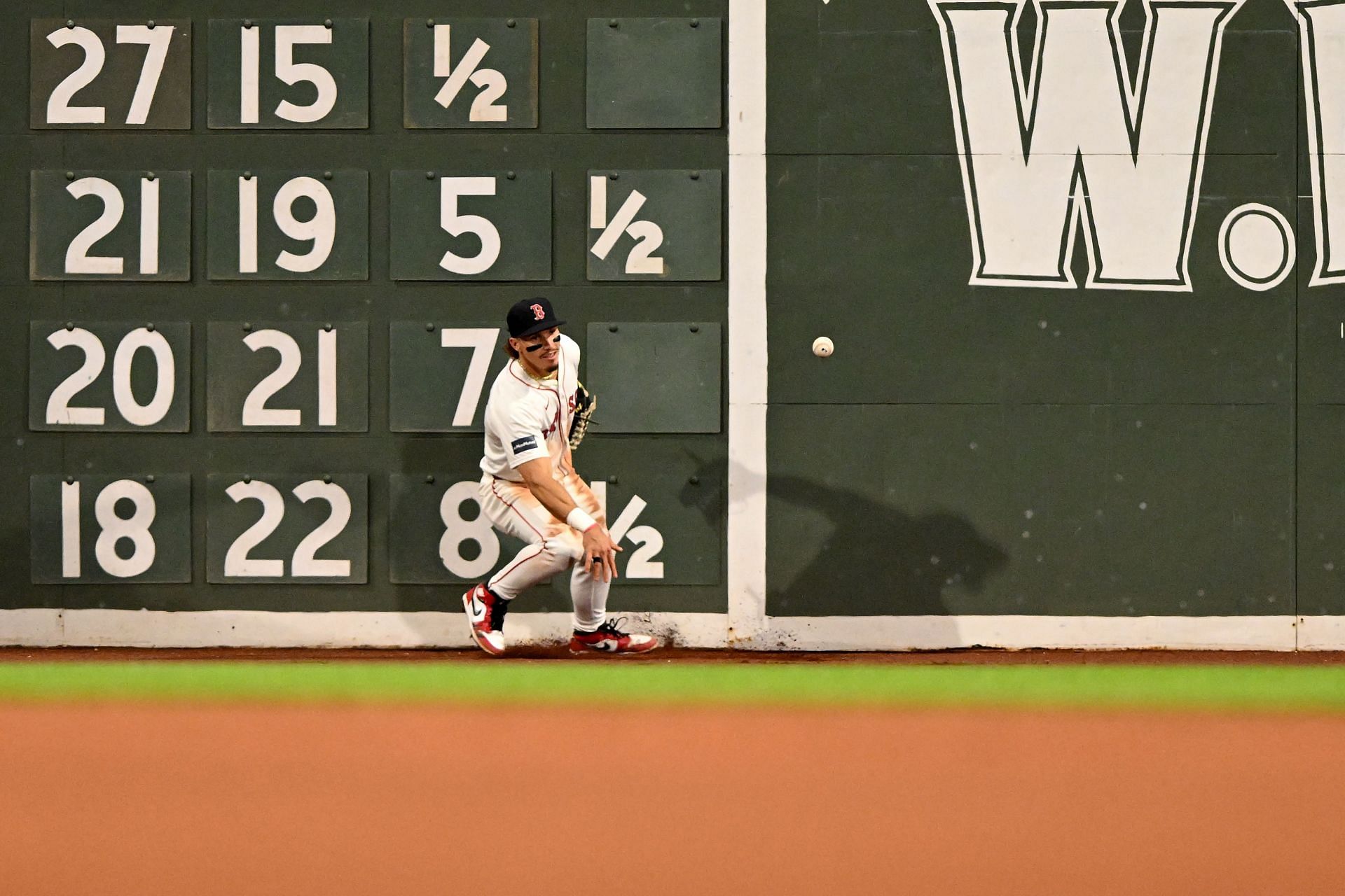 Jarren Duran fielding a ball in front of the Green Monster at Fenway Park last season (Image Source: IMAGN)