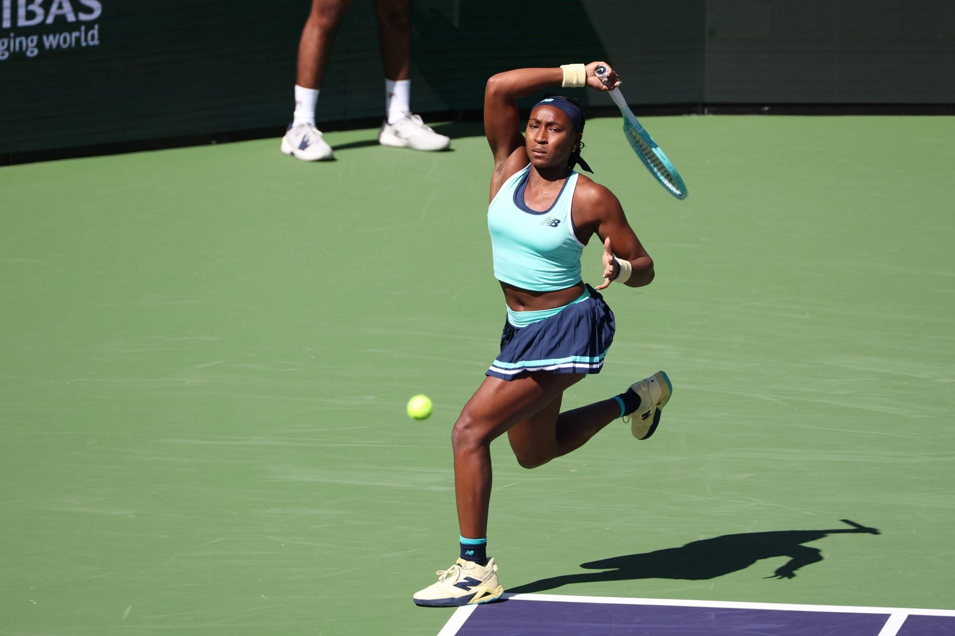 Gauff plays a running forehand in the BNP Paribas Open - Source: Getty