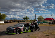 Crew members push the car of NASCAR K&N Pro Series driver Hailie Deegan in the pits during the Twin 100s at Tucson Speedway- Source: Imagn
