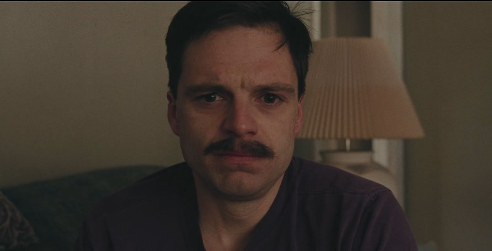 Sebastian Stan in a still from I, Tonya. (Image via Prime Video)