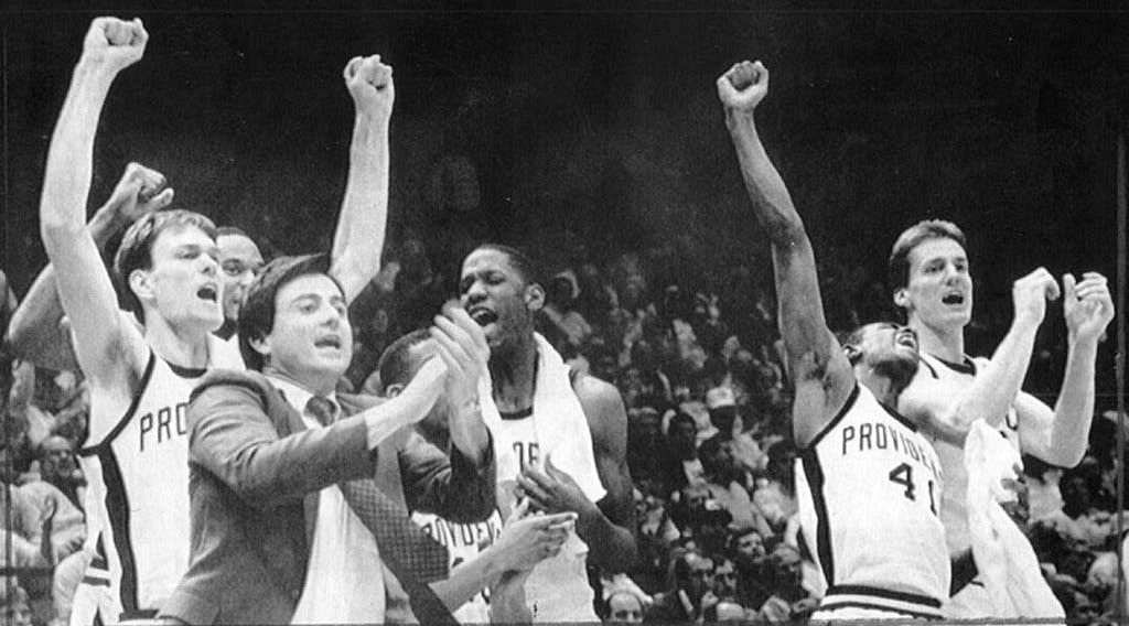 Rick Pitino celebrates a PC win in the 1987 NCAA Tournament. - Source: Imagn