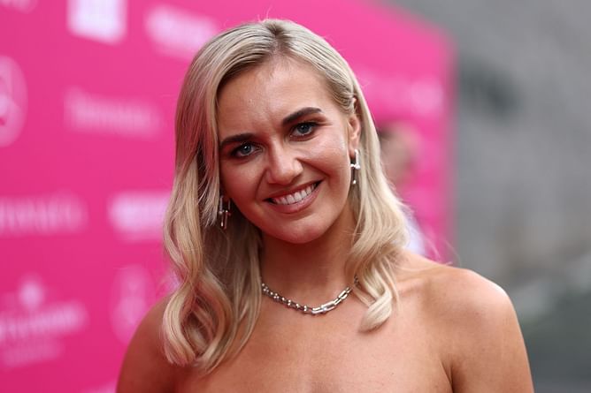Ariarne Titmus turns up the glamor in silver slit dress at Australian Grand Prix Glamour On The Grid Party