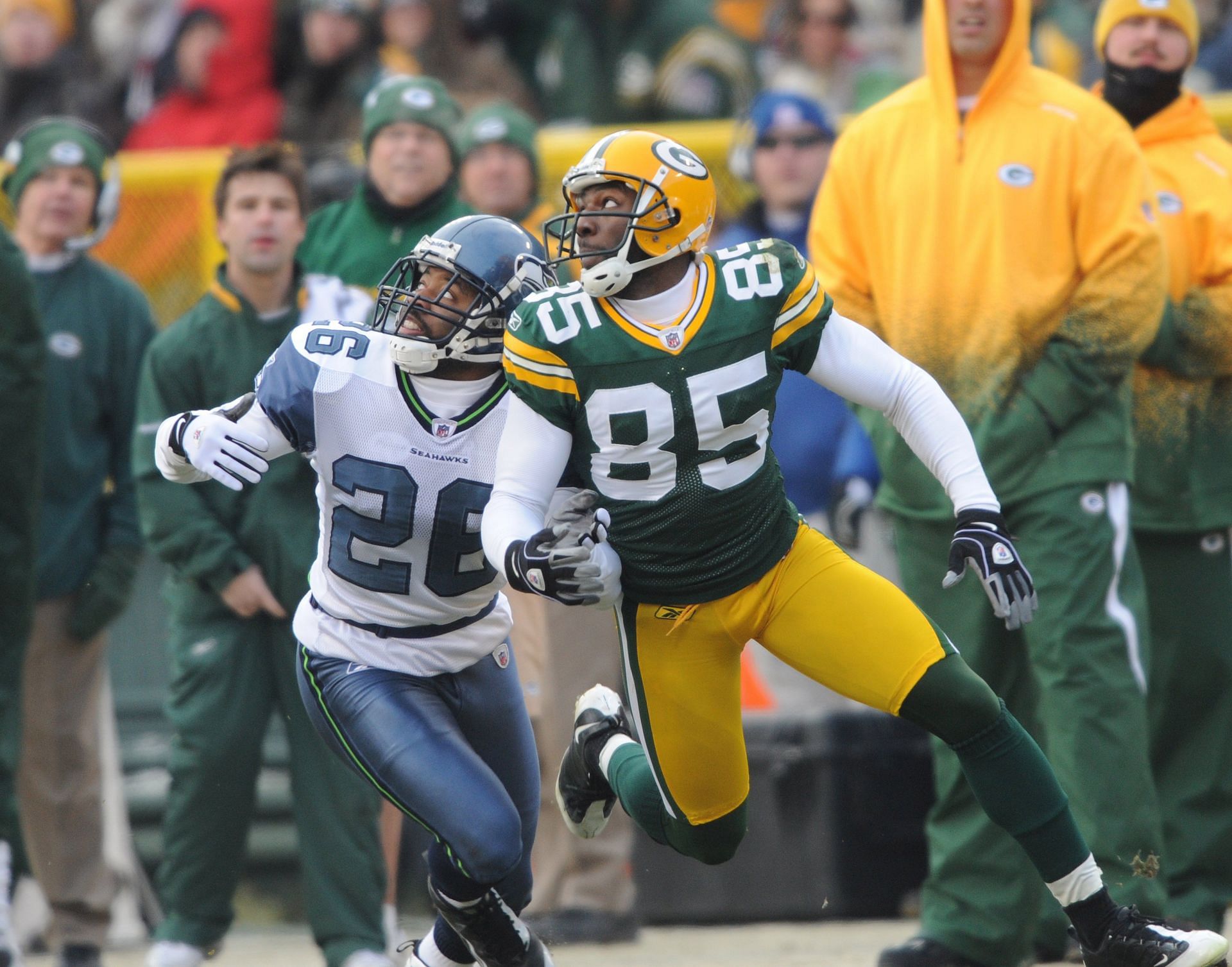 GREEN BAY - DECEMBER 27:  Greg Jennings #85 of the Green Bay Packers prepares to make a catch as Josh Wilson #26 of the Seattle Seahawks defends during an NFL game against the Seattle Seahawks at Lambeau Field, December 27, 2009 in Green Bay, Wisconsin.  (Photo by Tom Dahlin/Getty Images) - Source: Getty