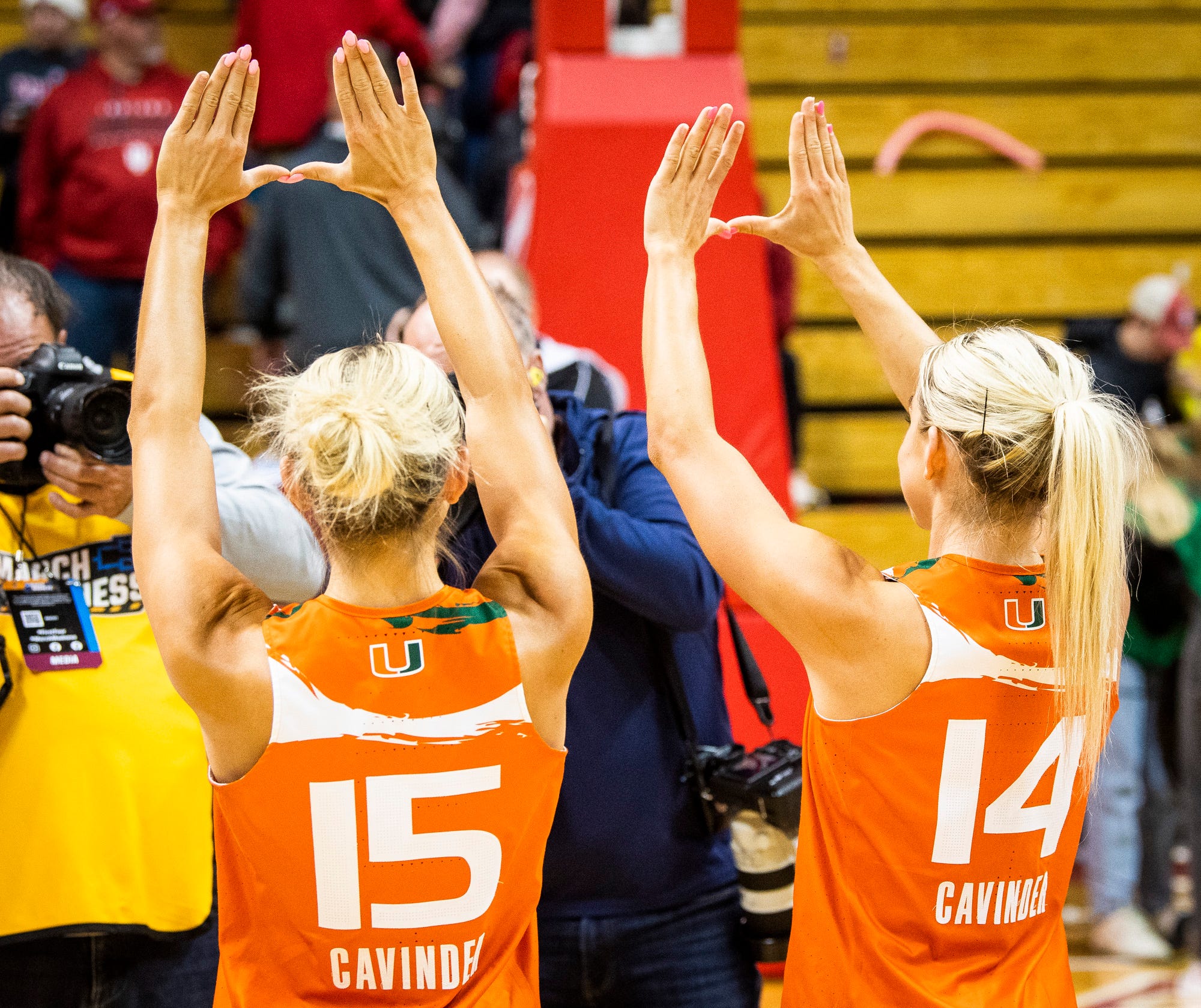 CAVINDER TWINS: Miami's Hanna Cavinder celebrates as twin Haley Cavinder cannot "convince" her for another year of college basketball