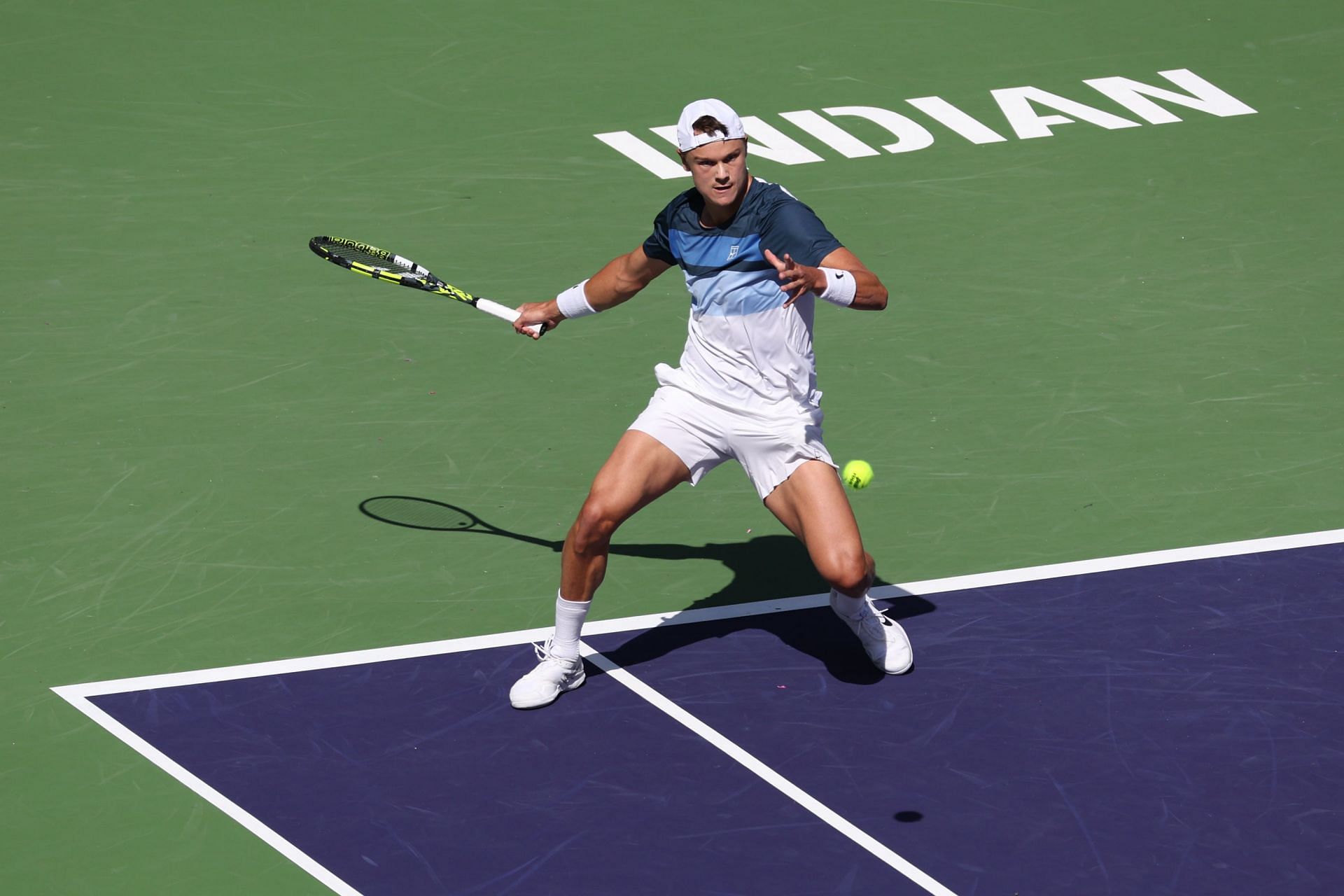 Holger Rune in action during the Indian Wells final. (Source: Getty)