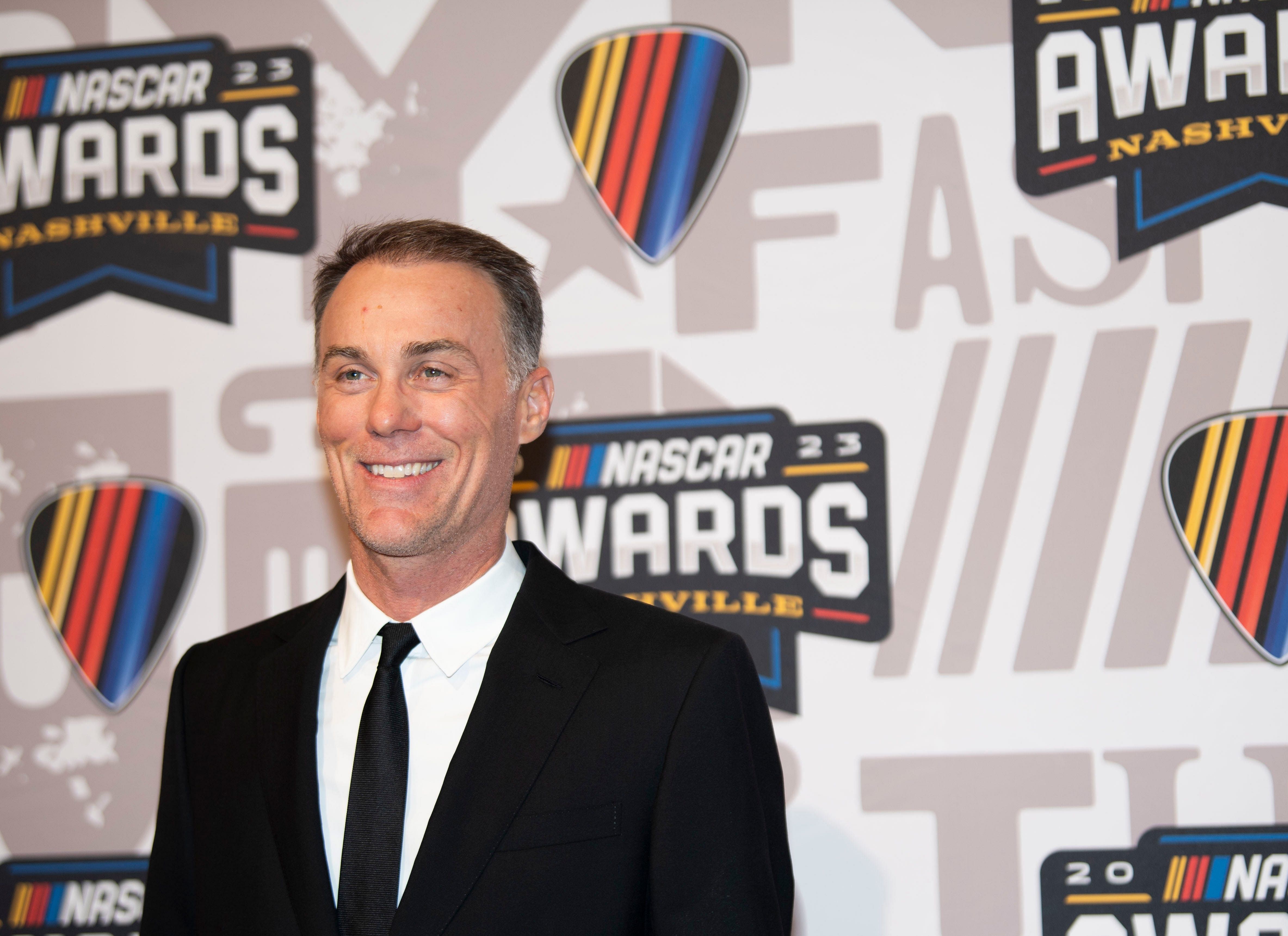 Kevin Harvick poses on the red carpet for the 2023 NASCAR Awards Banquet at the Music City Center in Nashville - Source: Imagn