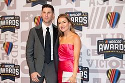 Denny Hamlin's fiance Jordan Fish flaunts her baby bump in a white maternity playsuit paired with an oversized blue cardigan in the latest IG update