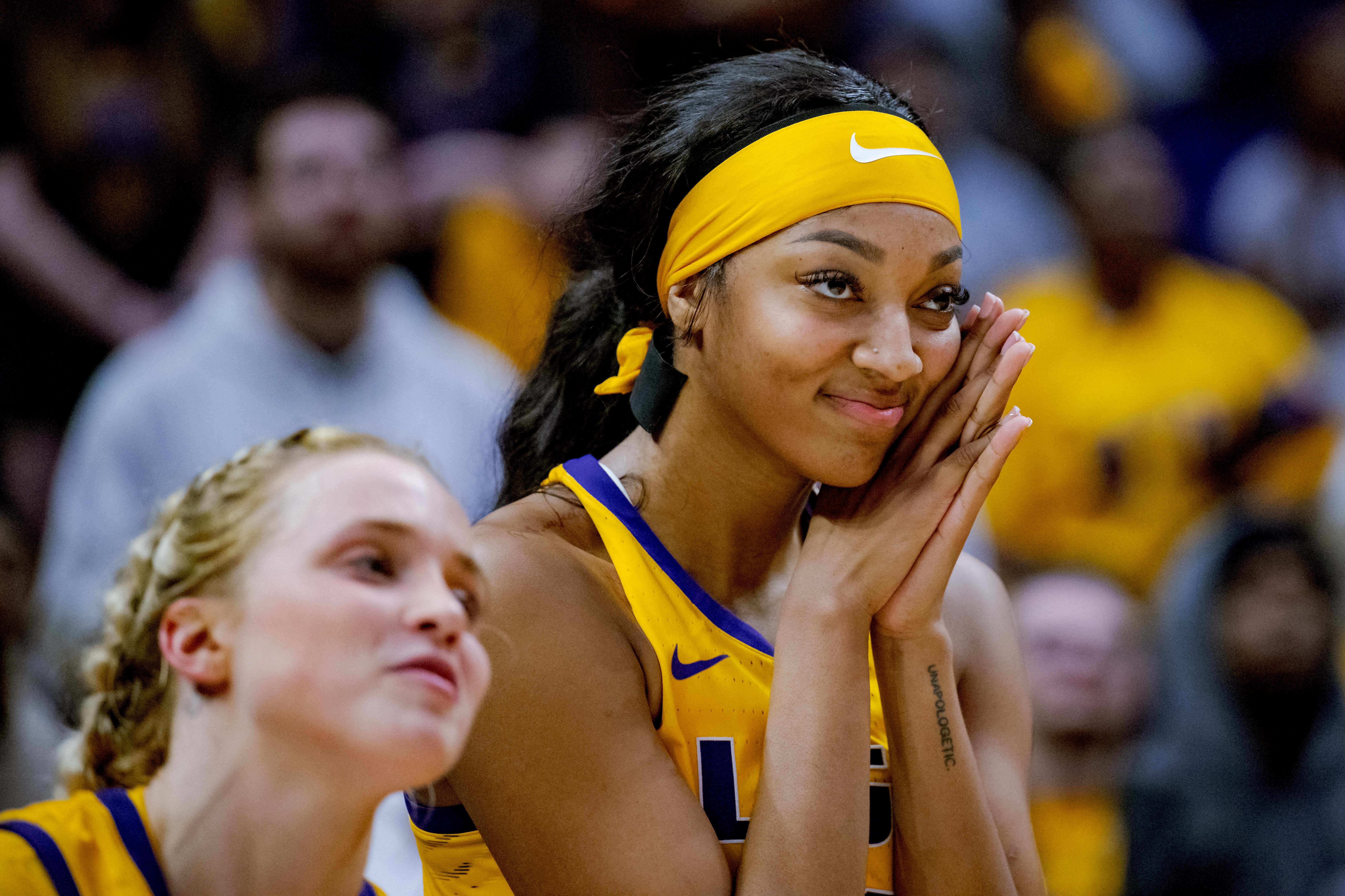 LSU Lady Tigers guard Hailey Van Lith and forward Angel Reese react to a senior tribute video for them at Pete Maravich Assembly Center. Photo Credit: Imagn