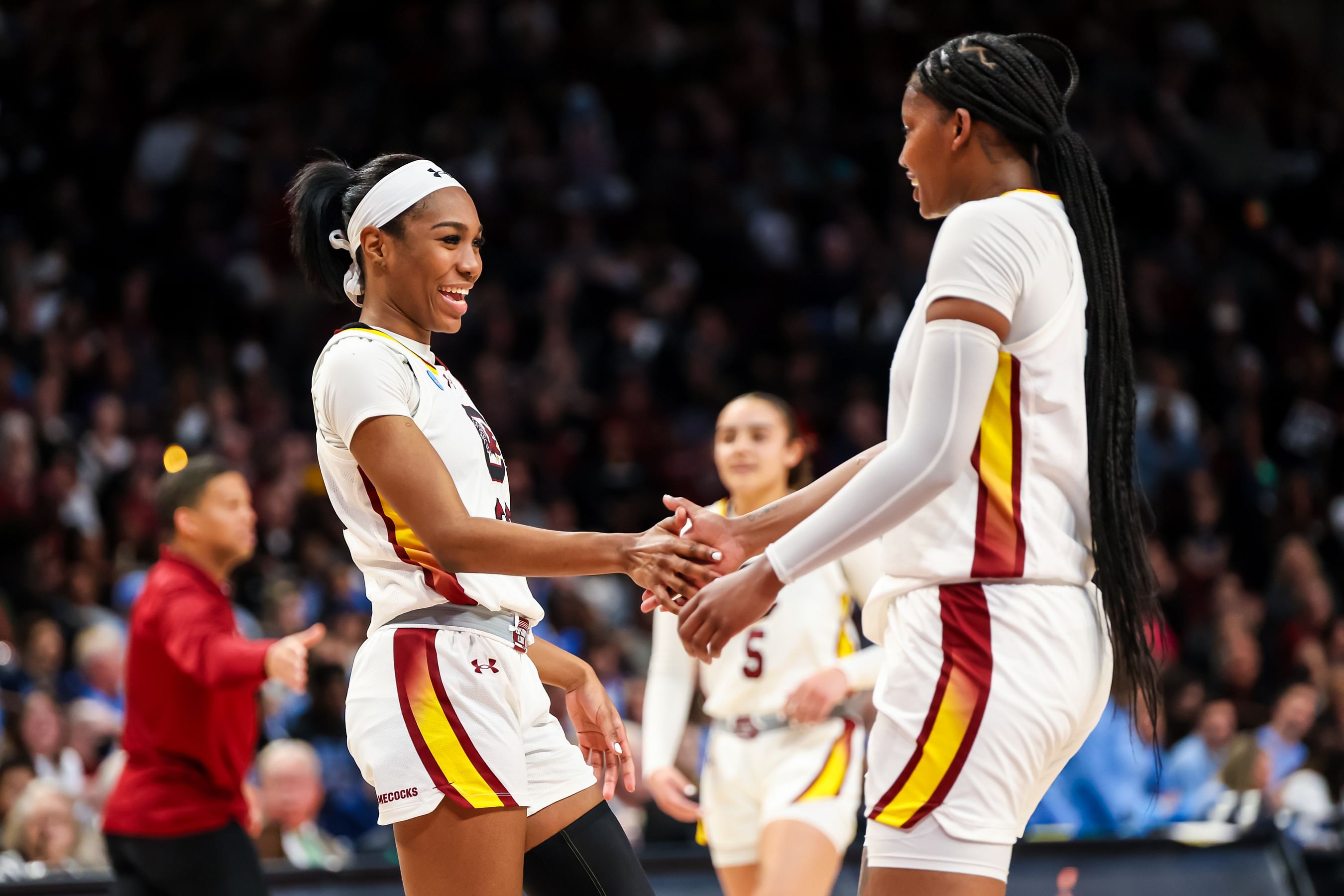 South Carolina Gamecocks guard Bree Hall (#23) and forward Sania Feagin (#20) celebrate a play against the North Carolina Tar Heels in the second half at Colonial Life Arena. Photo: Imagn