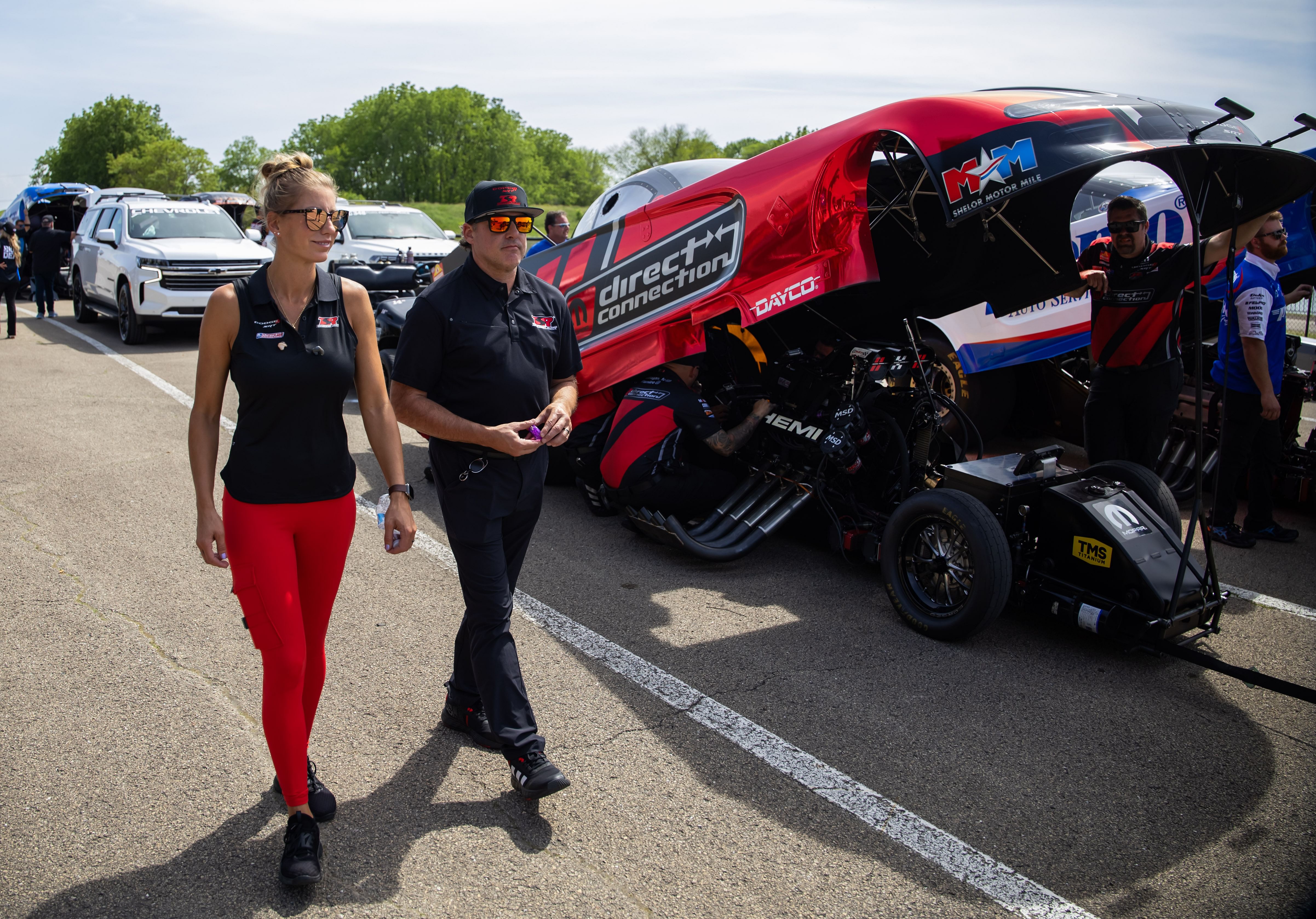 NHRA top fuel driver Tony Stewart (right) with wife Leah Pruett during the Route 66 Nationals at Route 66 Raceway - Source: Imagn