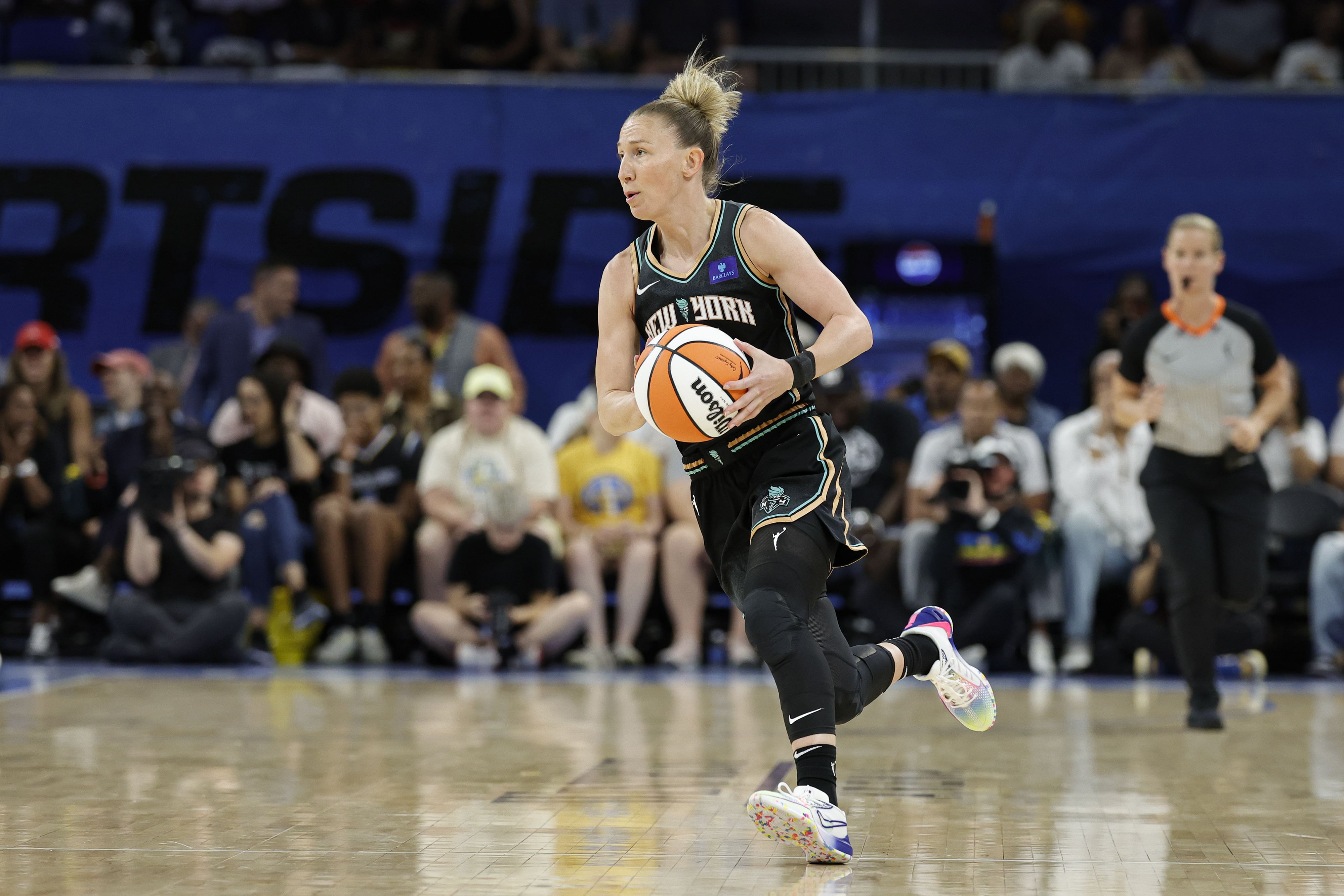 Guard Courtney Vandersloot brings the ball up court during the first half of a WNBA game at Wintrust Arena. Photo Credit: Imagn