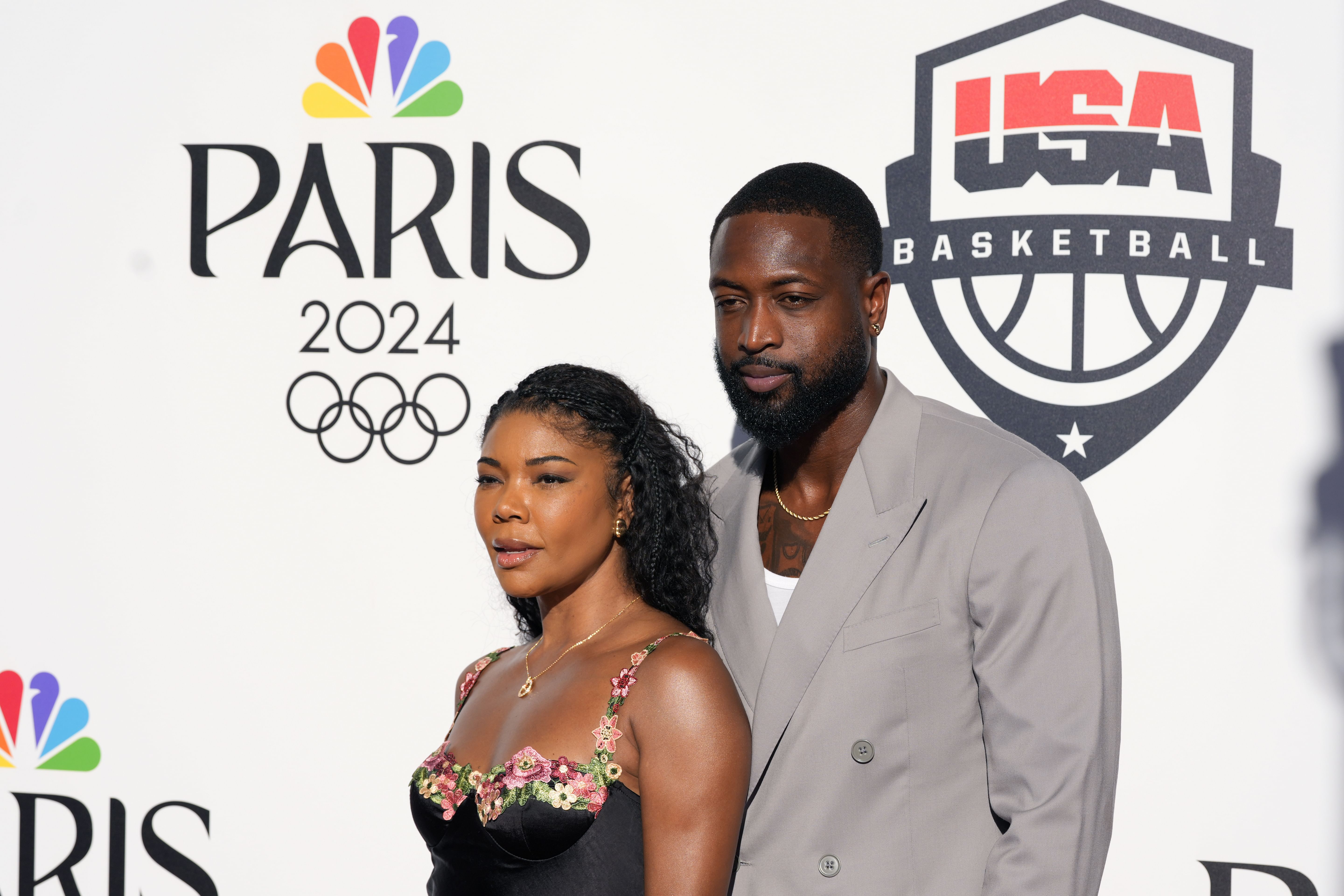 Aug 5, 2024; Paris, FRANCE; Dwyane Wade and wife Gabrielle Union pose for a photograph during the Paris 2024 Olympic Summer Games at Team USA House. Mandatory Credit: John David Mercer-Imagn Images - Source: Imagn