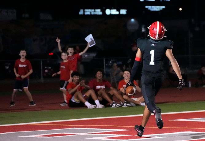 NFL legend Larry Fitzgerald Jr.'s son Devin Fitzgerald locks in on an official visit with UCLA Bruins, following interest from Bill Belichick
