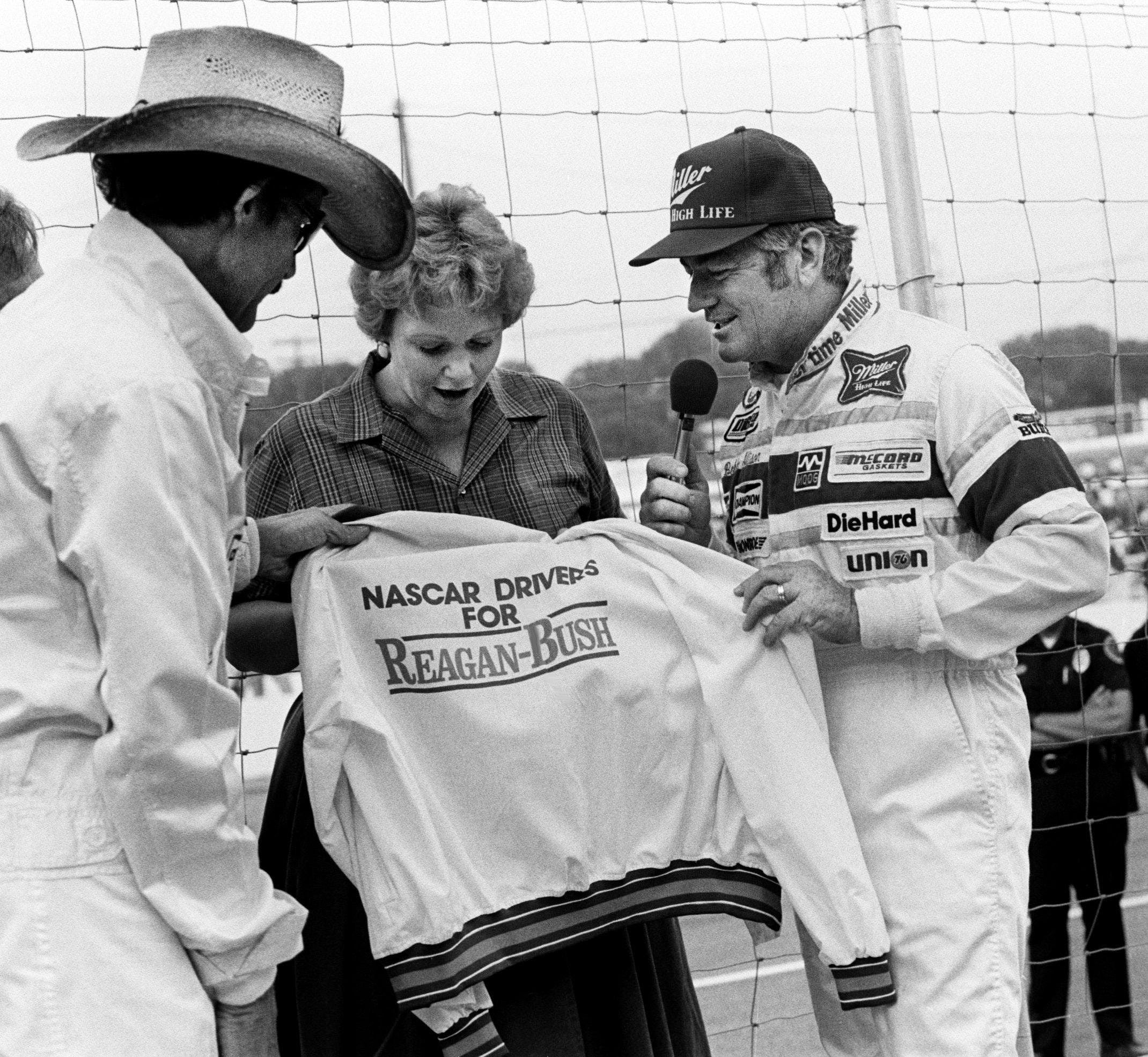 Bobby Allison (right) and Richard Petty (left) with Maureen Reagan at Nashville Pepsi 420 on July 14, 1984- Source: Imagn