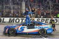 Kyle Larson celebrating with his son at Bass Pro Shops Night Race in 2024- Source: Imagn