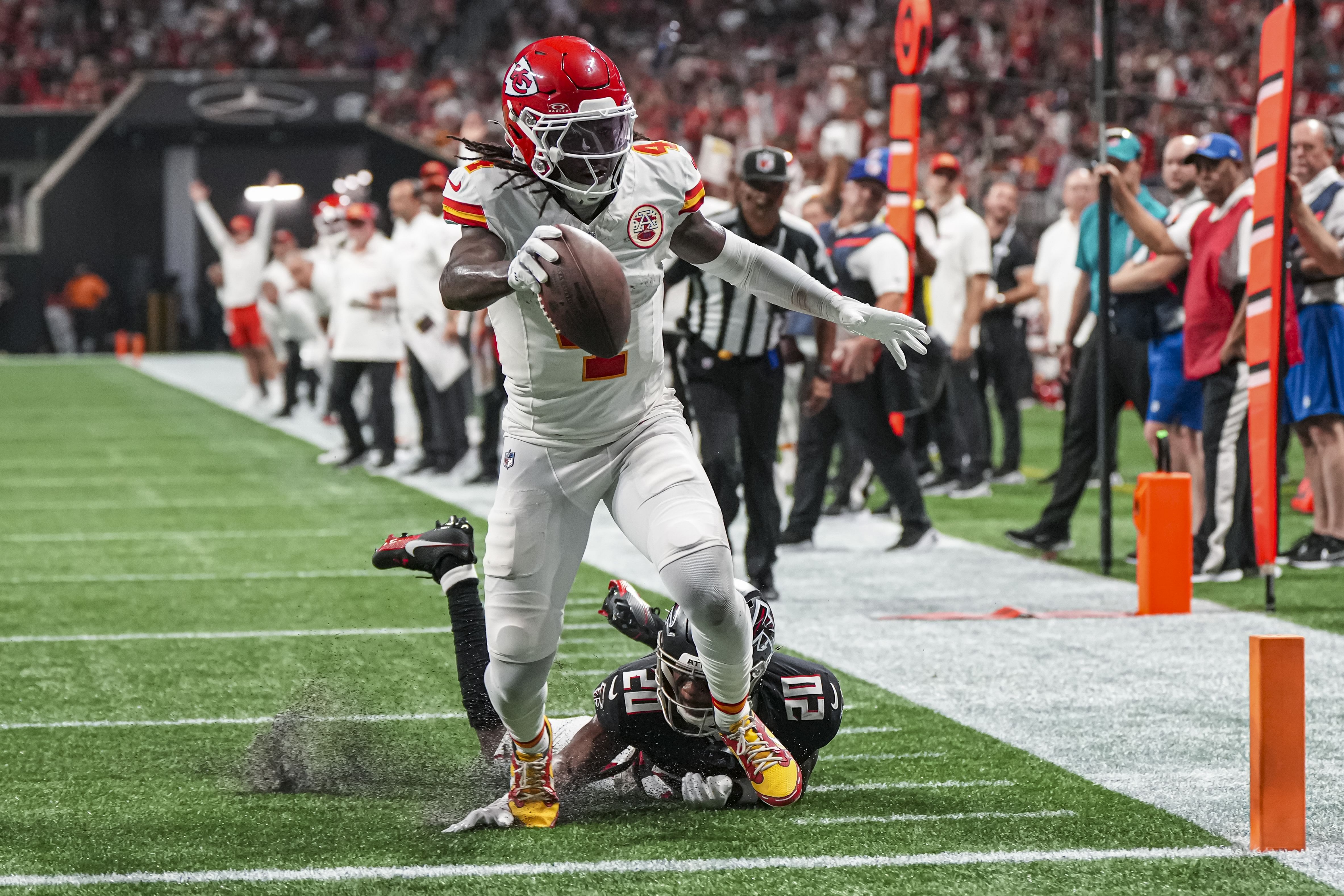 Kansas City Chiefs wide receiver Rashee Rice (4) scores a touchdown during an NFL game. (Credits: IMAGN)