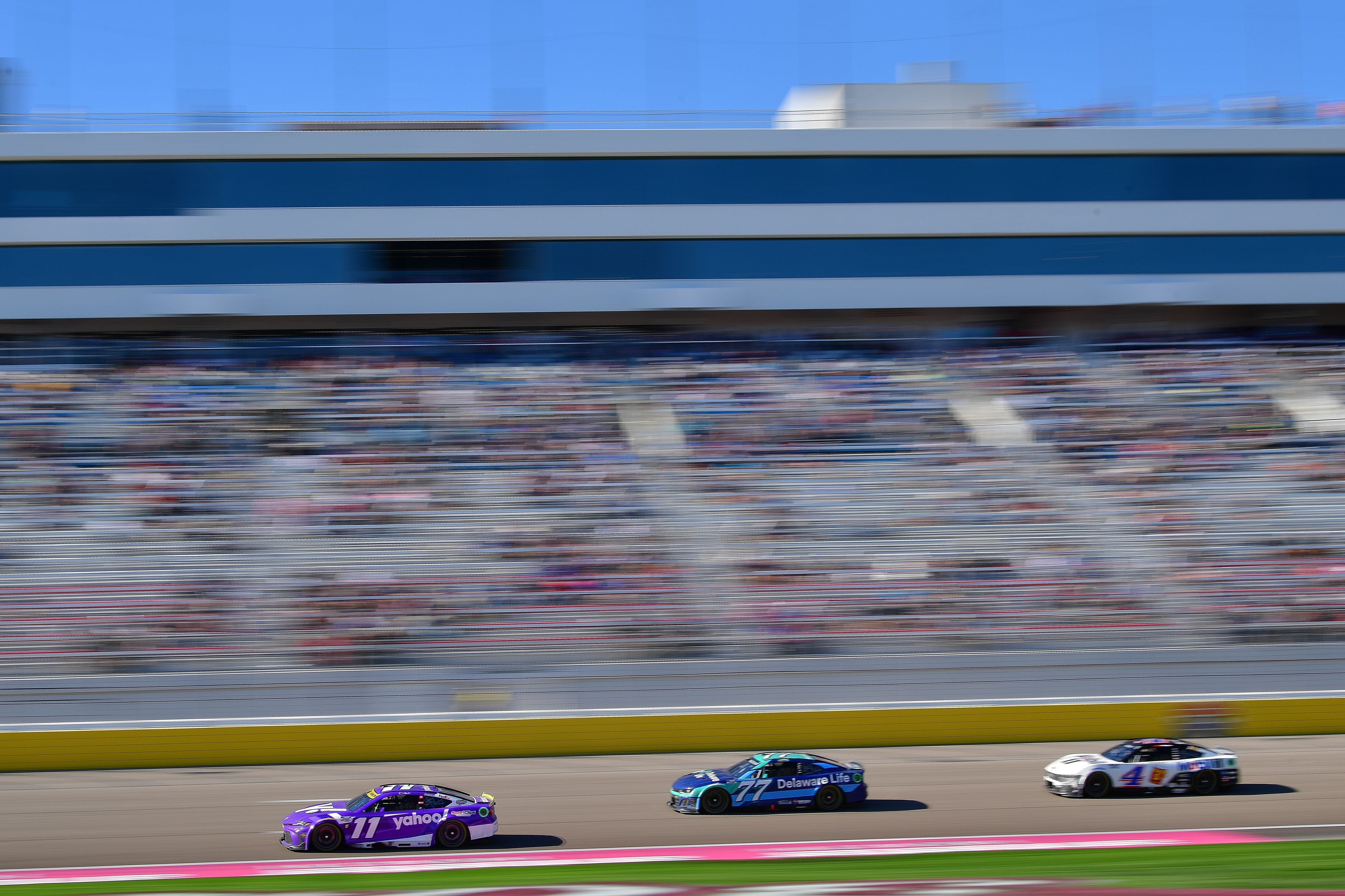 Denny Hamlin (11) leads Carson Hocevar (77) and Josh Berry (4) during the South Point 400 at Las Vegas Motor Speedway, 2024 - Source: Imagn