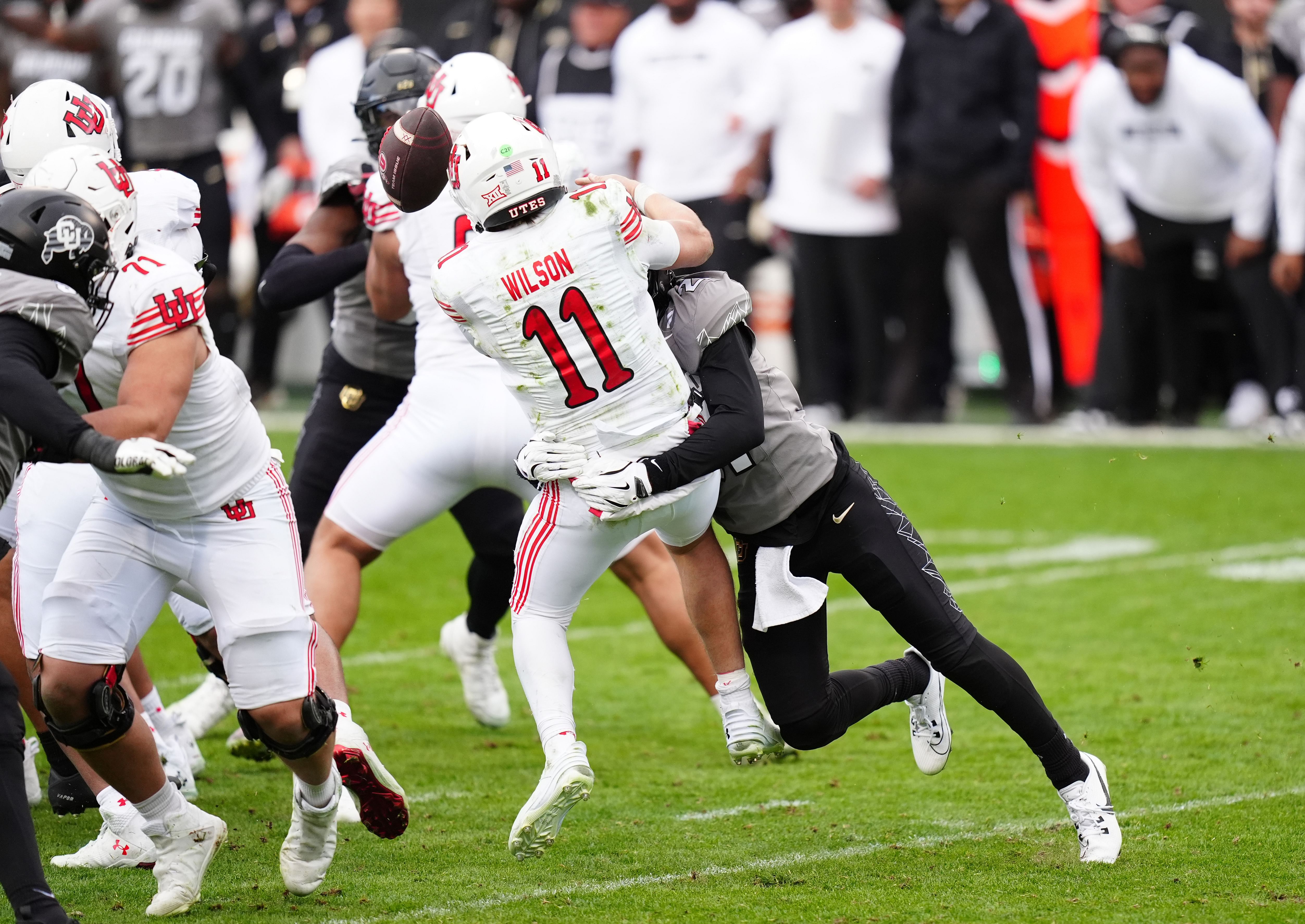 Shilo Sanders (21) forces a fumble - Source: Imagn