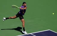 Berrettini plays a backhand in the BNP Paribas Open - Source: Getty