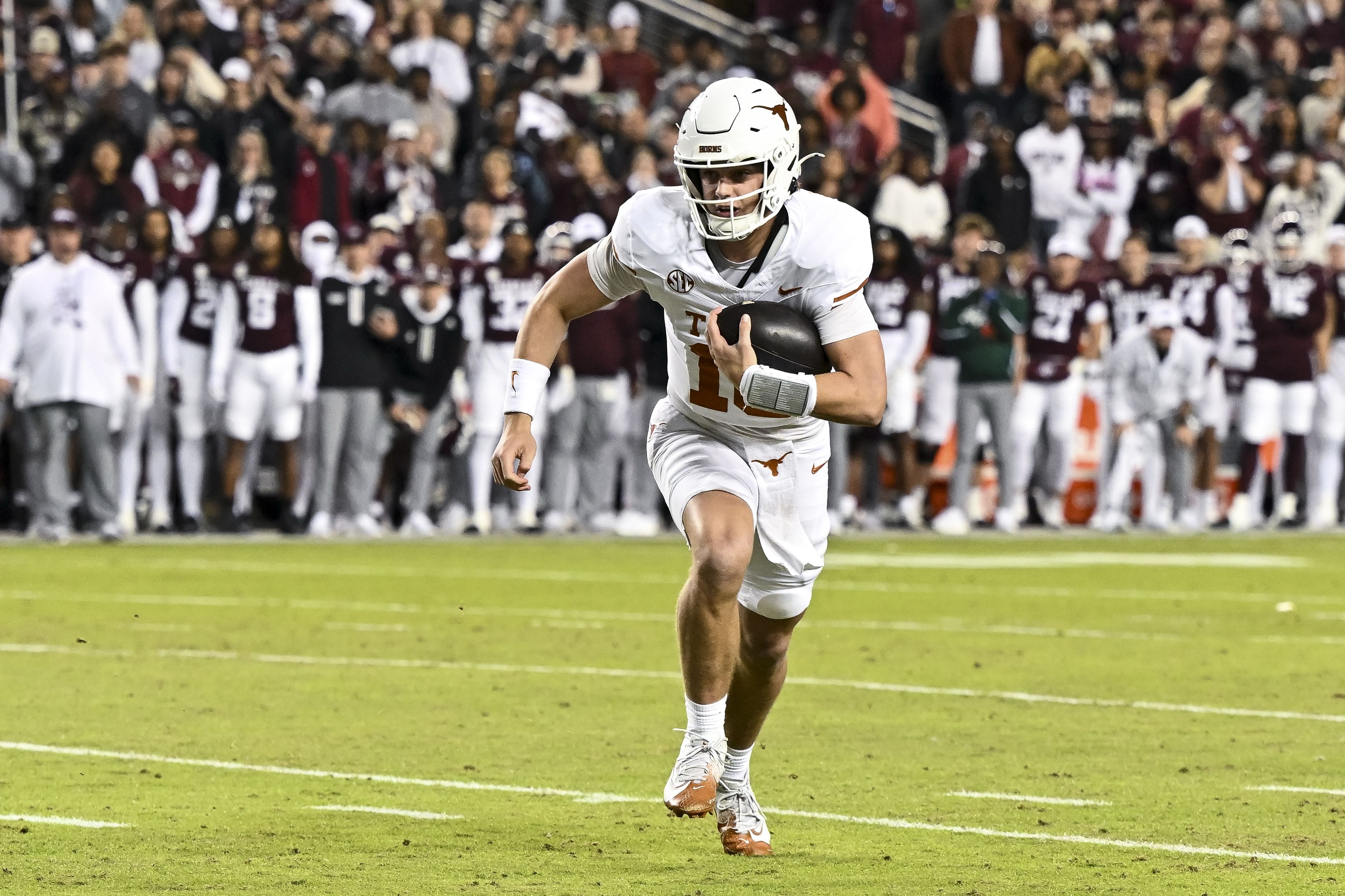 Texas Longhorns quarterback Arch Manning (16) runs the ball during an NCAA Football game. (Credits: IMAGN)