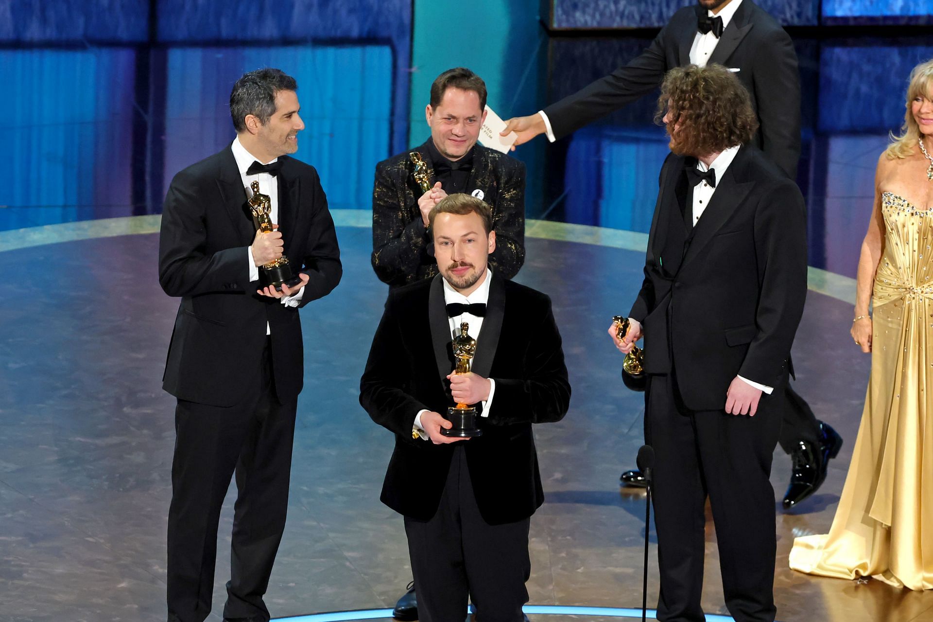 Flow received the Best Animated Feature award during the 97th Academy Awards (Image via Getty)