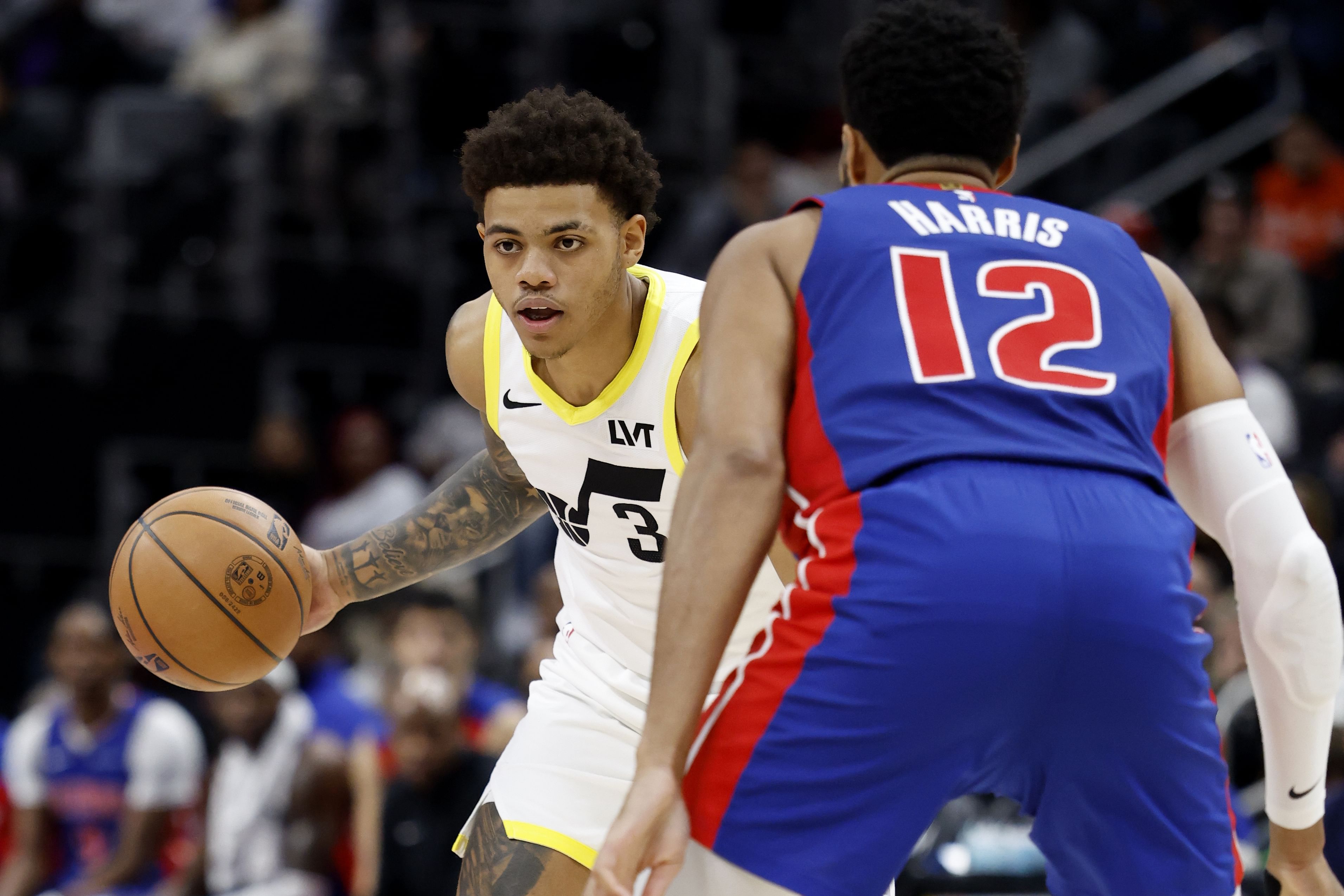 Utah Jazz guard Keyonte George dribbles defended by Detroit Pistons forward Tobias Harris at Little Caesars Arena. Photo Credit: Imagn