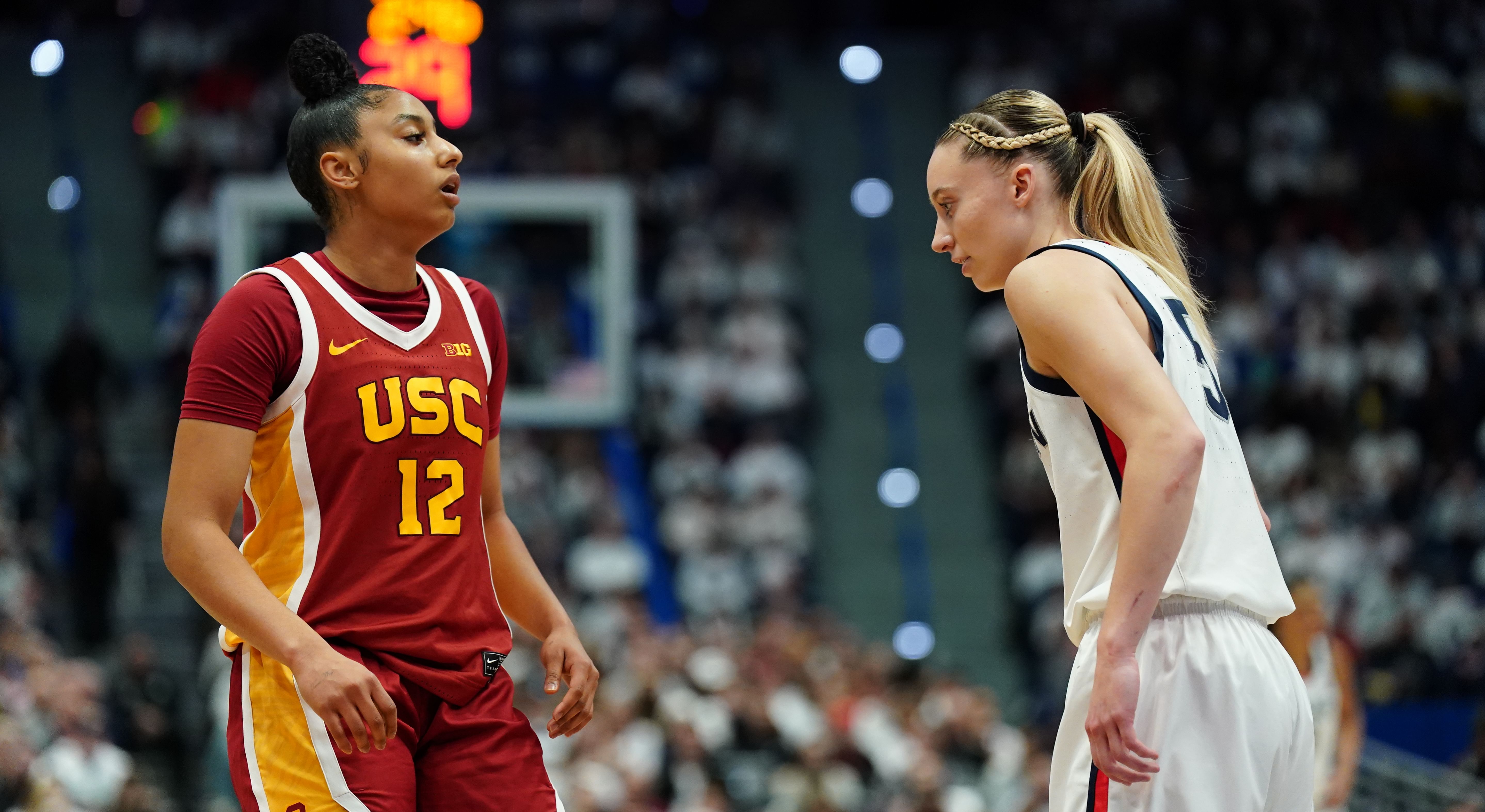 UConn Huskies guard Paige Bueckers (5) and USC Trojans guard JuJu Watkins (12) on the court in the first half at XL Center. Photo: Imagn