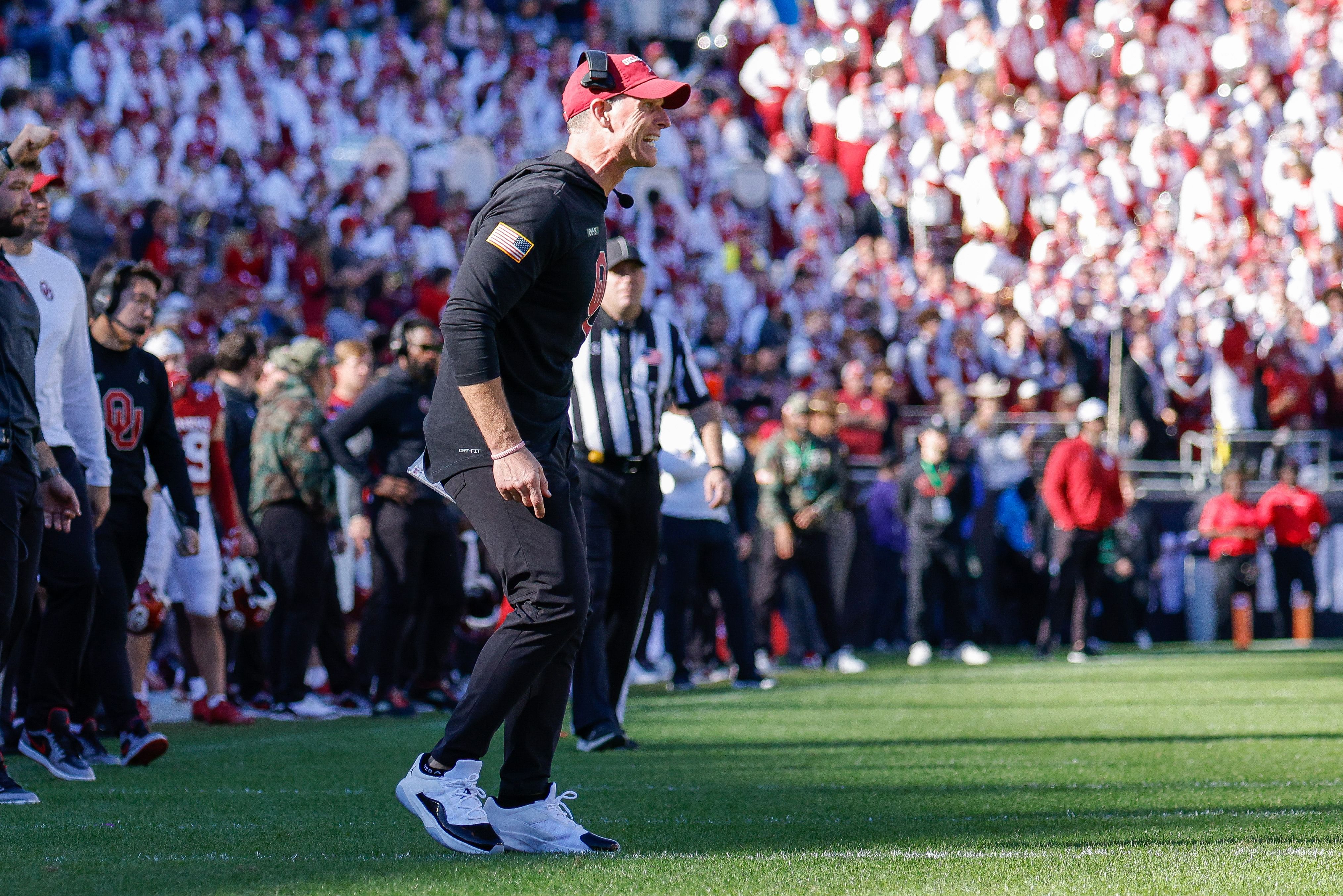 Brent Venables yells out to his players - Source: Imagn