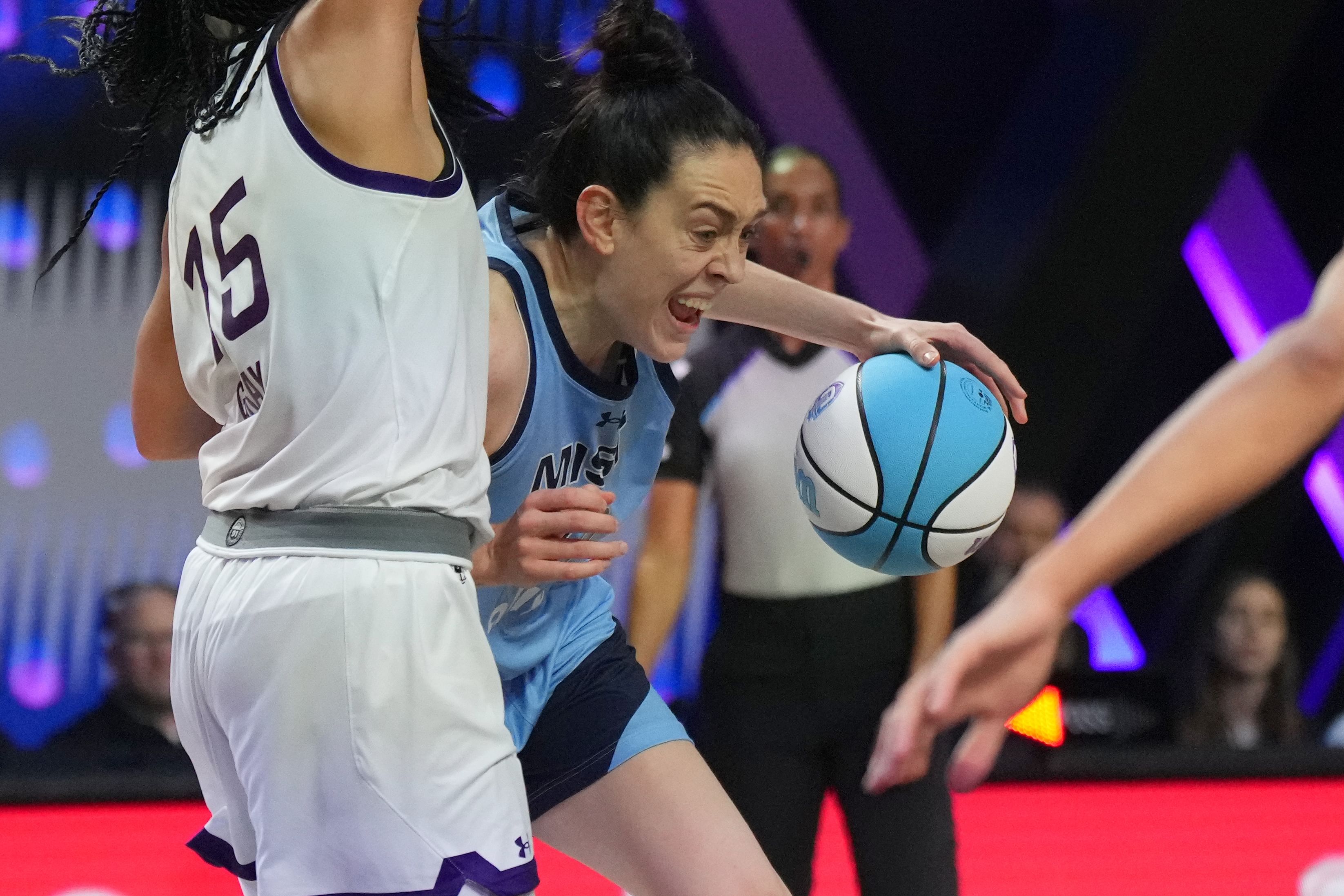 Jan 17, 2025; Miami, FL, USA; Breanna Stewart (30) of the Mist collides with Allisha Gray (15) of the Lunar Owls during the second half of the Unrivaled women&rsquo;s professional 3v3 basketball league at Wayfair Arena. Mandatory Credit: Jim Rassol-Imagn Images - Source: Imagn