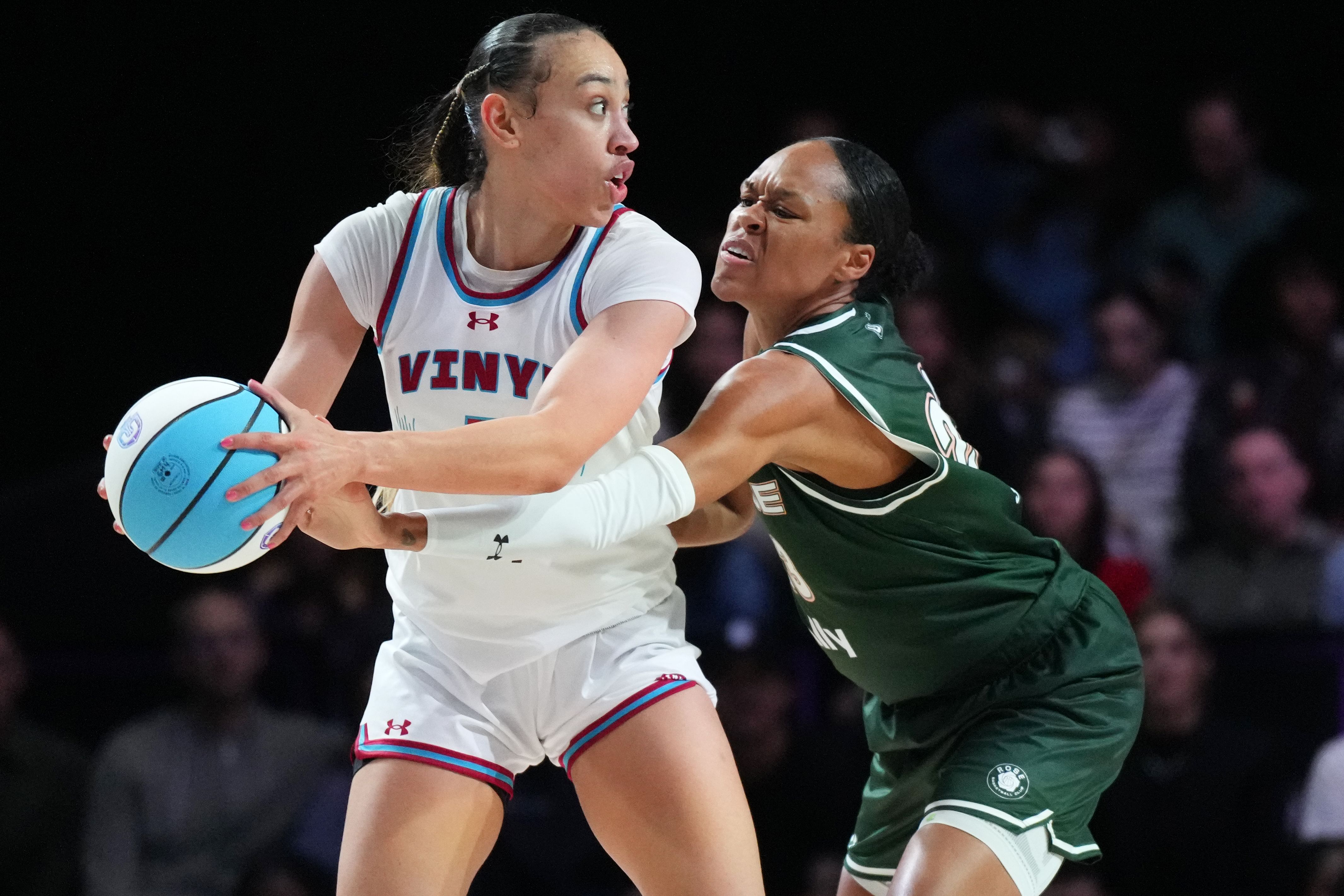 Jan 17, 2025; Miami, FL, USA; Dearica Hamby (5) of the Vinyl looks to pass the ball as Azura Stevens (23) of the Rose defends during the second half of the Unrivaled women&rsquo;s professional 3v3 basketball league at Wayfair Arena. Mandatory Credit: Jim Rassol-Imagn Images - Source: Imagn