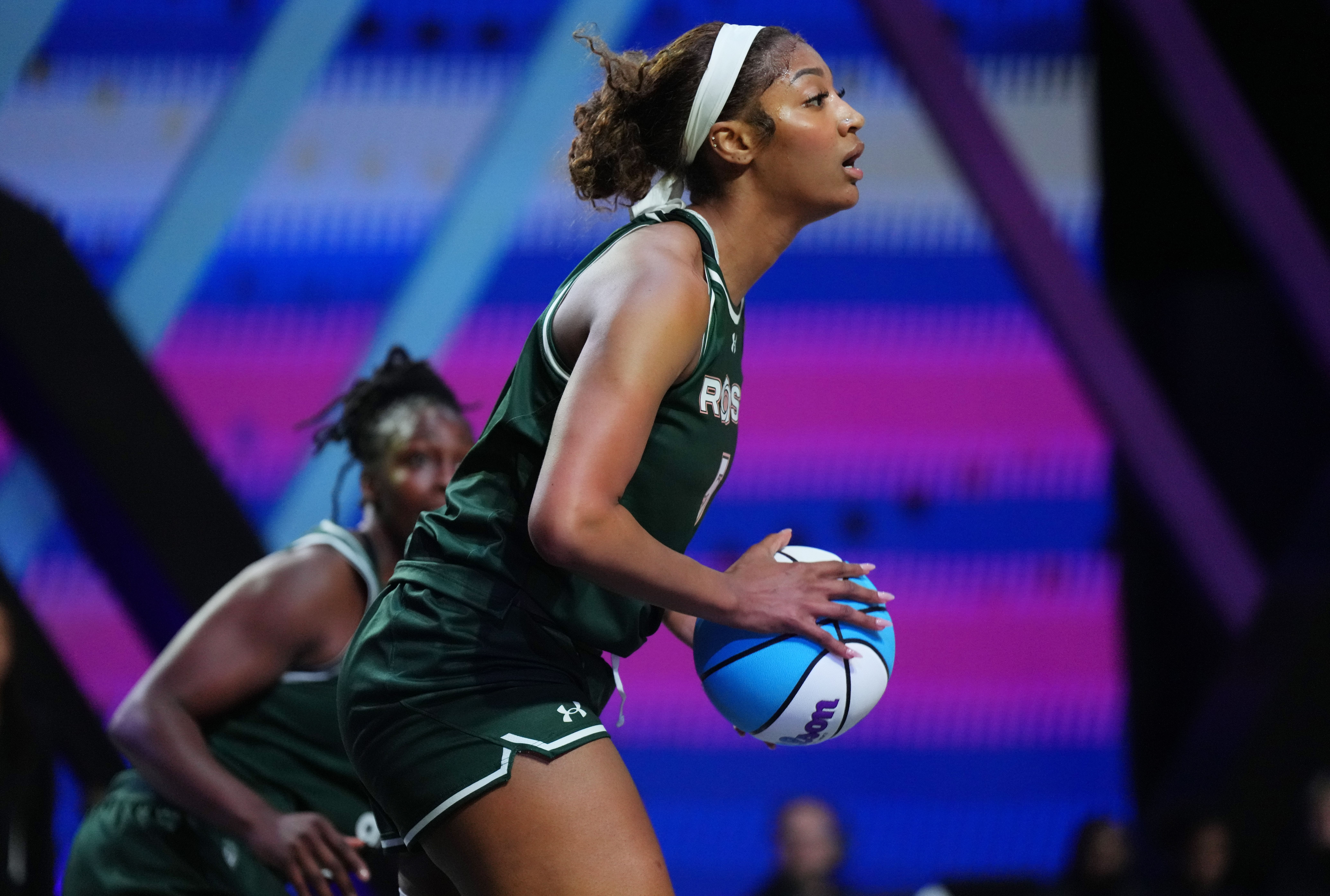 Jan 17, 2025; Miami, FL, USA; Angel Reese (5) of the Rose takes a shot against the Vinyl in the first half of the Unrivaled women&rsquo;s professional 3v3 basketball league at Wayfair Arena. Mandatory Credit: Jim Rassol-Imagn Images - Source: Imagn