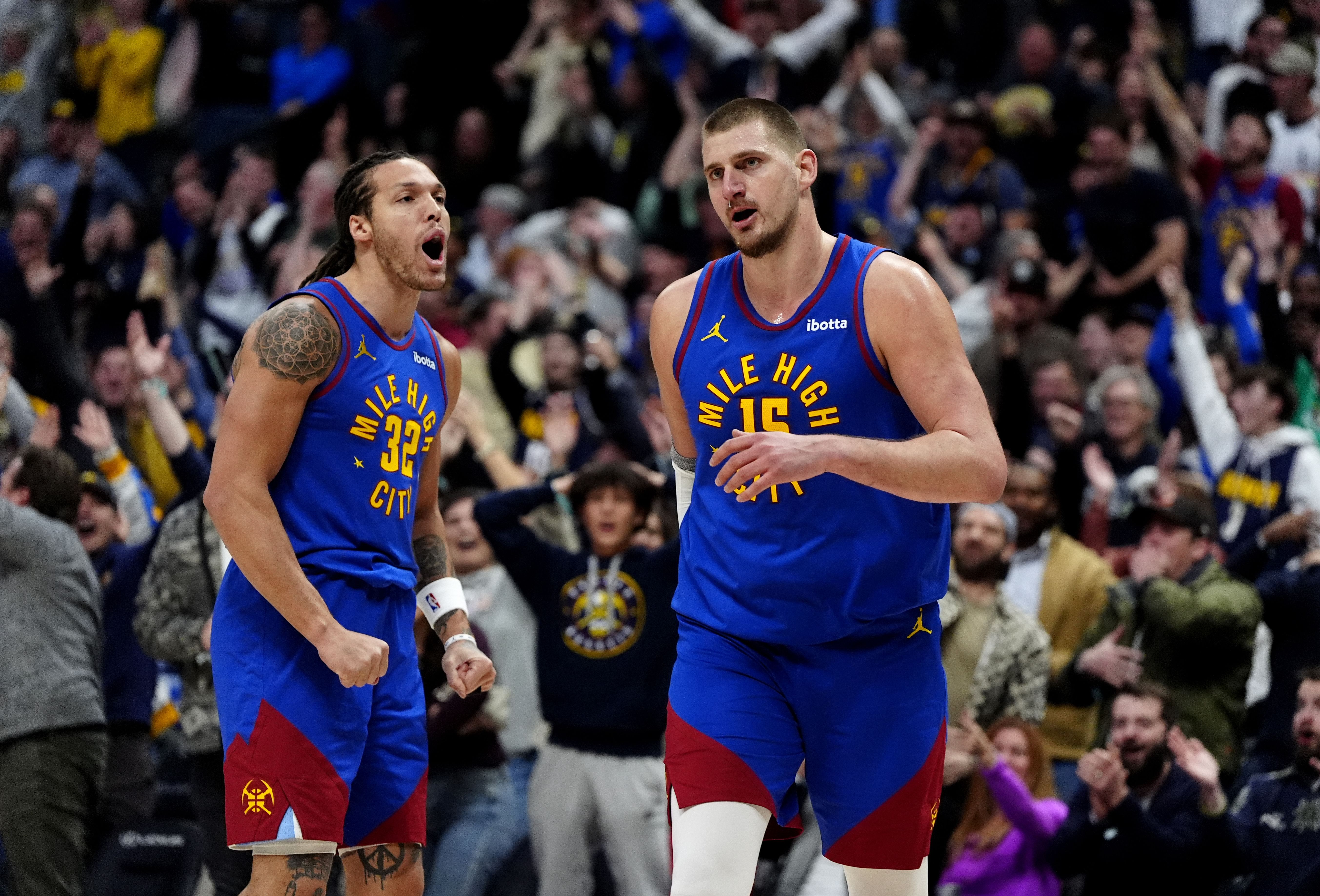 Denver Nuggets center Nikola Jokic reacts along side forward Aaron Gordon following a full court basket against the Sacramento Kings at Ball Arena. Photo Credit: Imagn