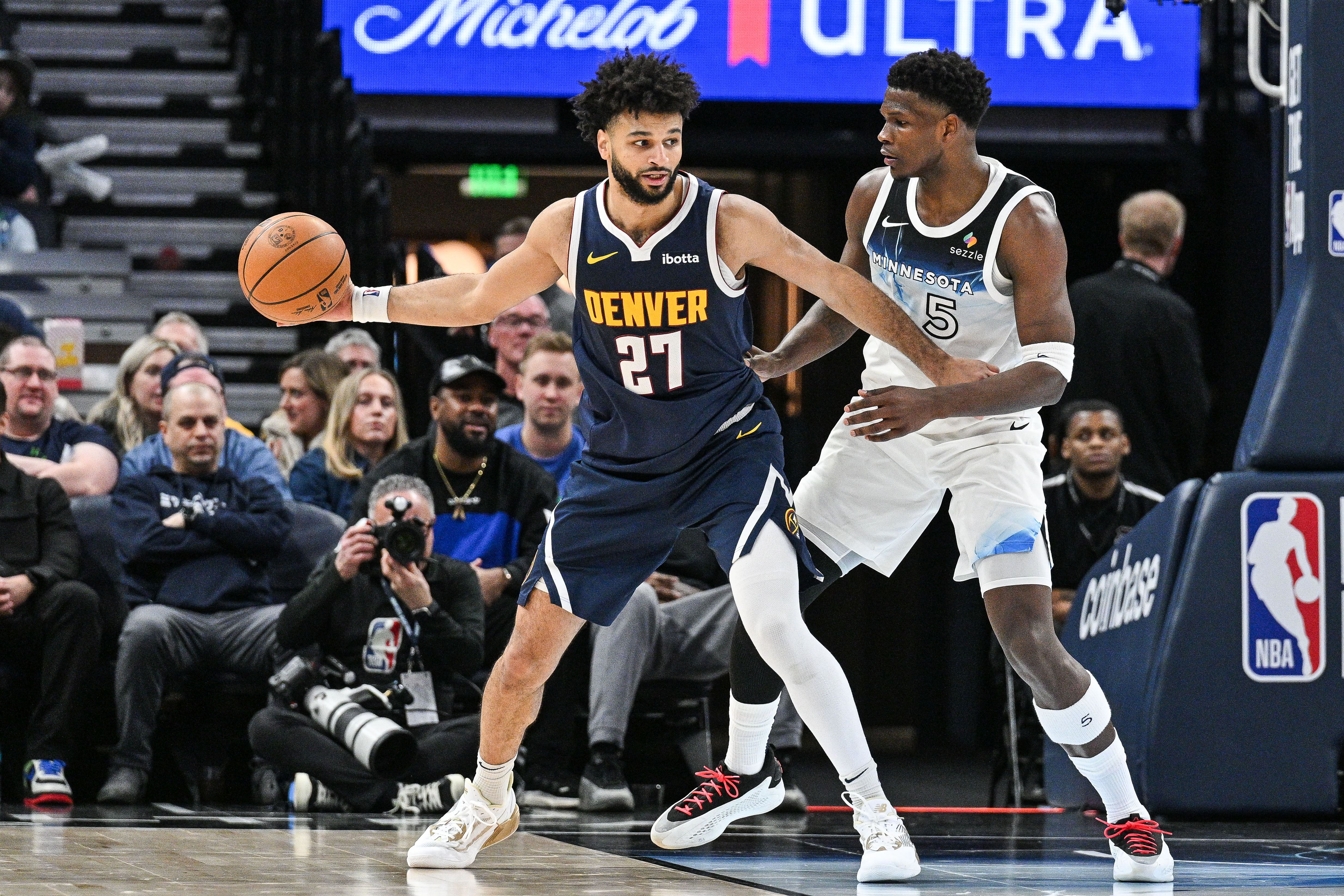 Denver Nuggets guard Jamal Murray in action against Minnesota Timberwolves guard Anthony Edwards during an NBA game. (Credits: IMAGN)